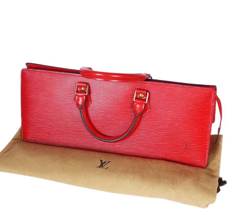 Louis Vuitton Red Epi Sac Triangle Wide Handbag at 1stdibs
