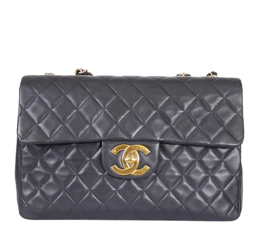 Vintage Chanel jumbo classic flap bag in excellent vintage condition. Biggest classic in 2.55 Family. This vintage Chanel jumbo classic adds effortless cool to any outfit. Thanks to the adjustable chain, it can be worn casually over the shoulder or