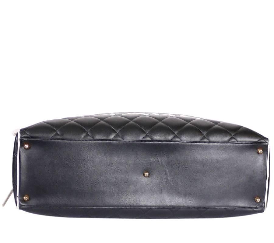 Women's Vintage Chanel Black Leather Letter Logo Jumbo Bowling Bag