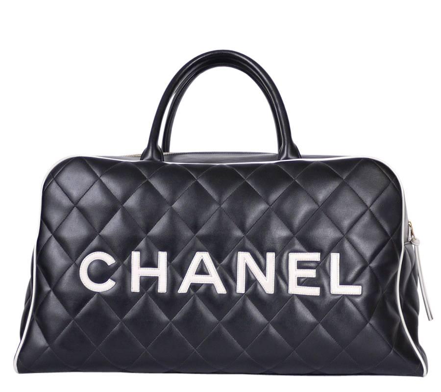 Vintage Chanel black leather large bowling bag. Very large enough to use as weekend bag. All leather made. Kept in excellent condition. Truly gorgeous vintage Chanel.

    Material : Lambskin
    Comes with : Hologram sticker
    Year: Early