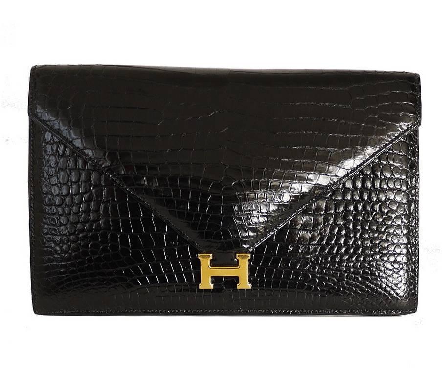 

This striking Authentic Hermes Lydie bag is the super gorgeous vintage handbag from 1998. This is extremely hard to find bag anywhere in the world. Well cared, beautiful bag condition. Wearing Hermes crocodile handbag is the symbol of status. In