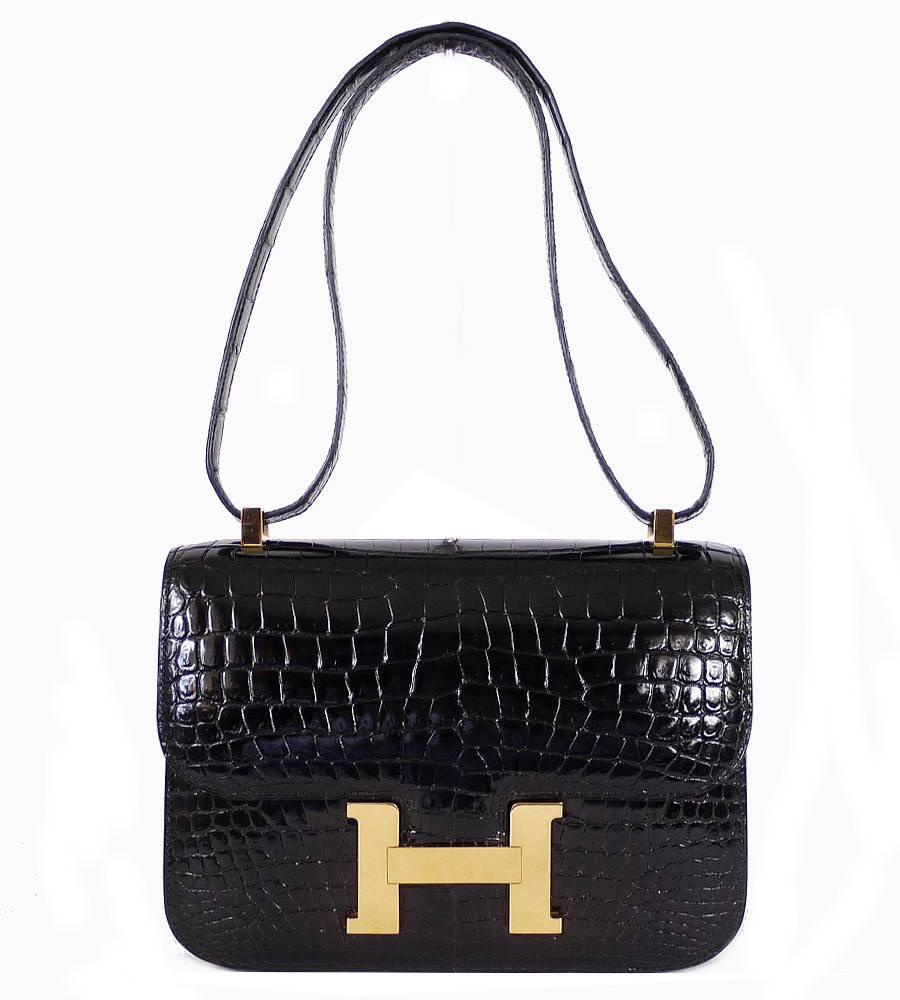 Hermes crocodile porosus Constance bag 23cm with gold hardware. Made in 1990. Well cared, super beautiful Constance bag. Exceptional craftsmanship has fashioned the iconic shape of the Constance23 out of Crocodile skin. Delightfully compact, this