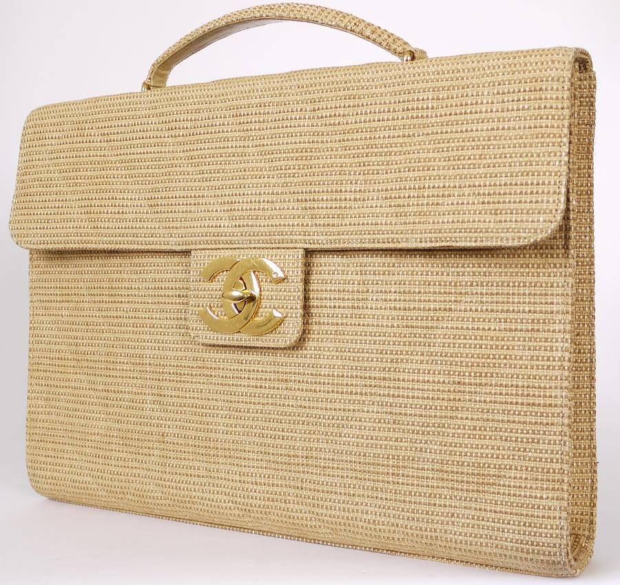 Chanel straw canvas computer bag. You can put your laptop in the bag. Perfect bag for summer. This is quite hard to find large Chanel bag.

Material : Straw canvas
Main color : Tan, Beige
Includes : Certificate card, dust bag

Condition :