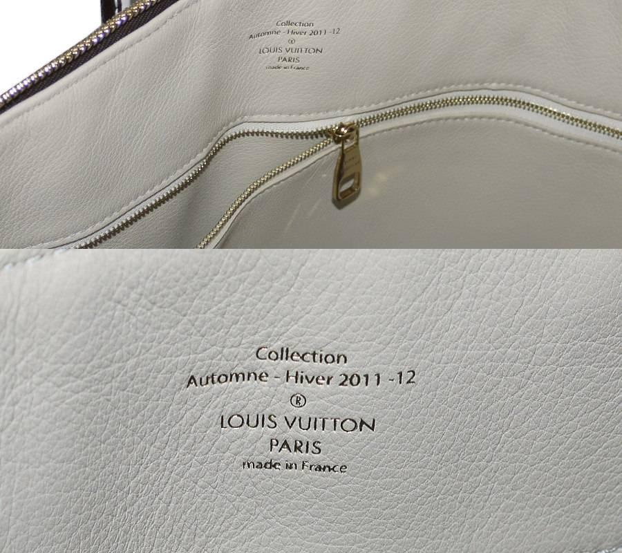 Louis Vuitton Shiny Monogram Fetish Lockit Voyage Travel Bag In Excellent Condition For Sale In Hiroshima City, JP
