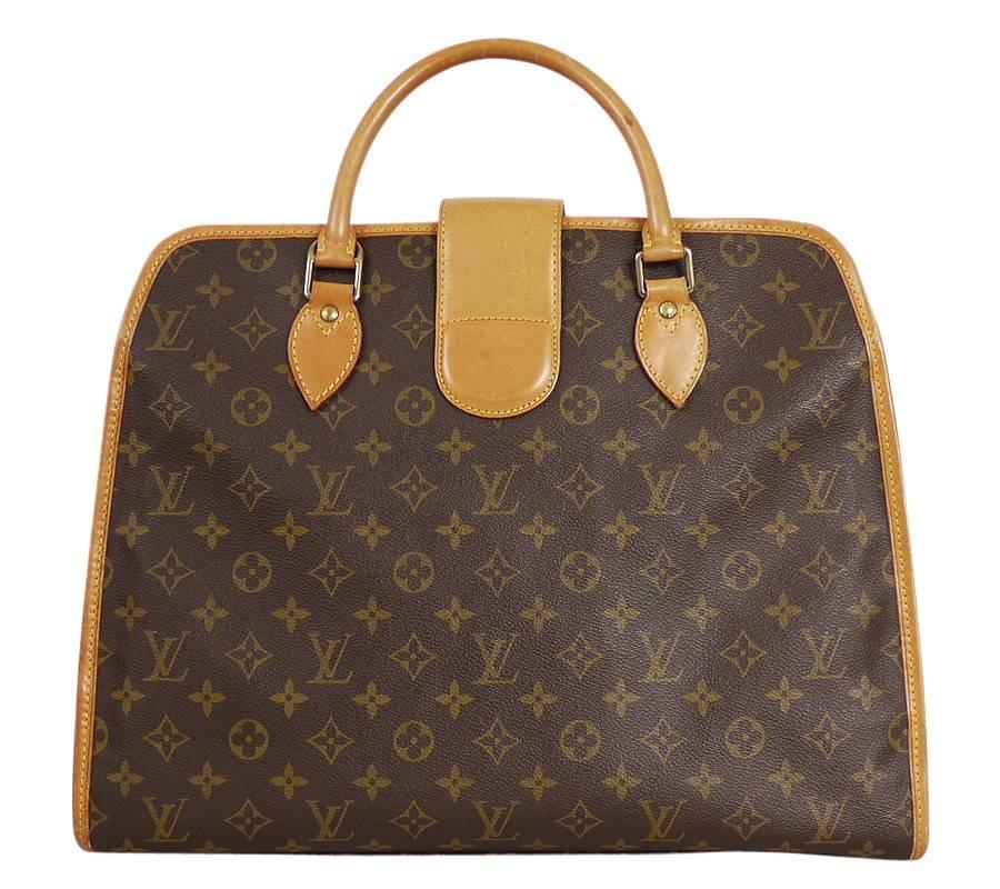Louis Vuitton Rivoli Briefcase. This is no longer in production and very hard to find. This Rivoli briefcase is in excellent condition. This soft briefcase will hold your important documents, computers and business accessories in style.

Feature :