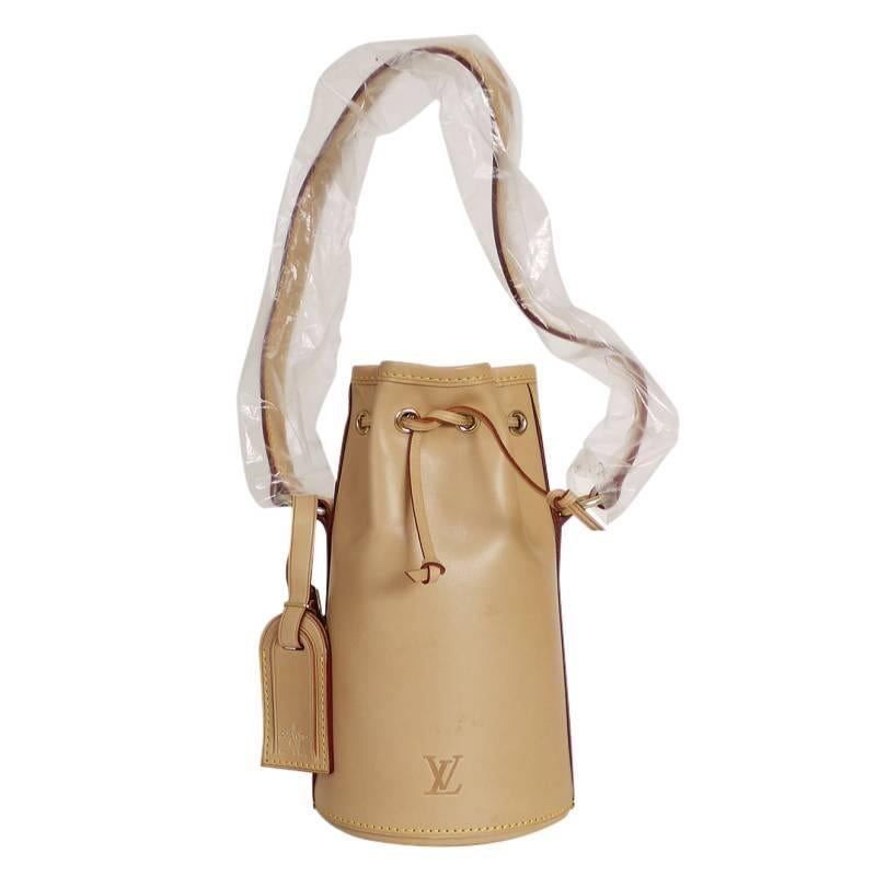 Louis Vuitton x Dom Perignon Limited Edition Champagne Carrier. Quite hard to find, Collector's item. Limited numbers were manufactured in year 2000 and this is 0070/1000. Never used. This champagne carrier still have tag and protective covers.