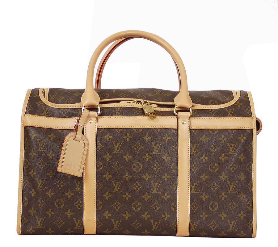 Louis Vuitton Monogram Dog Carrier 50in excellent used condition. This spacious pet carrier is resistant to water and scratches. It comes equipped with a double zip-around closure and a breathable mesh window.Original price $2940 excluding tax.