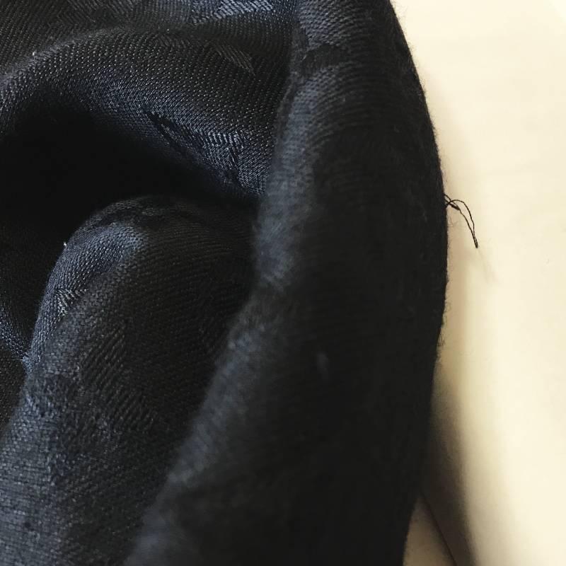 Soft and warm due to its mixture of silk and wool this shawl is printed tone-on-tone with the Monogram pattern signed Louis Vuitton Paris. Its style is classical and timeless.

56.1 x 56.1 inches (Length x Width) 
60% silk and 40% wool
Printed with