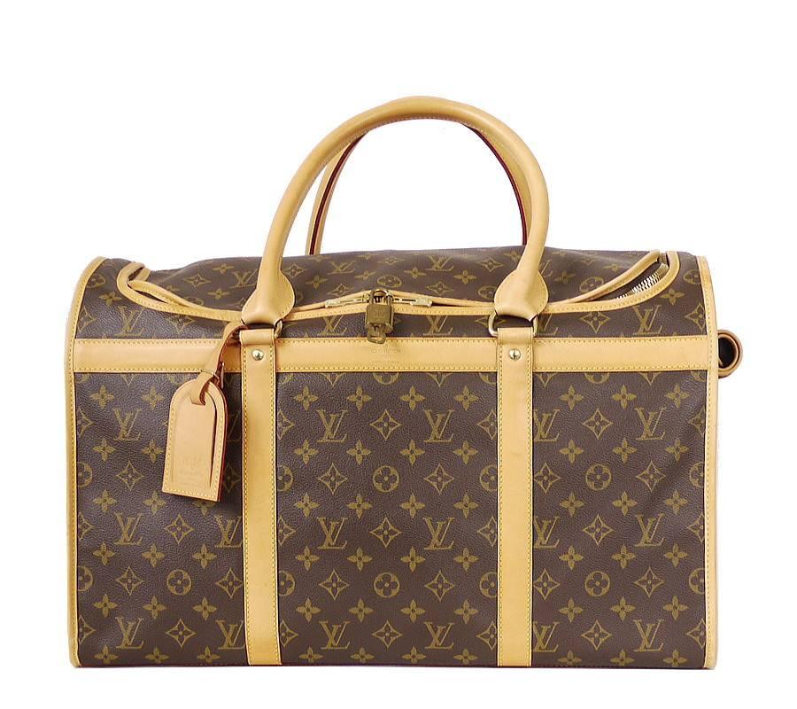Louis Vuitton Monogram Dog Carrier 50in excellent used condition. This spacious pet carrier is resistant to water and scratches. It comes equipped with a double zip-around closure and a breathable mesh window.Original price $2940 excluding