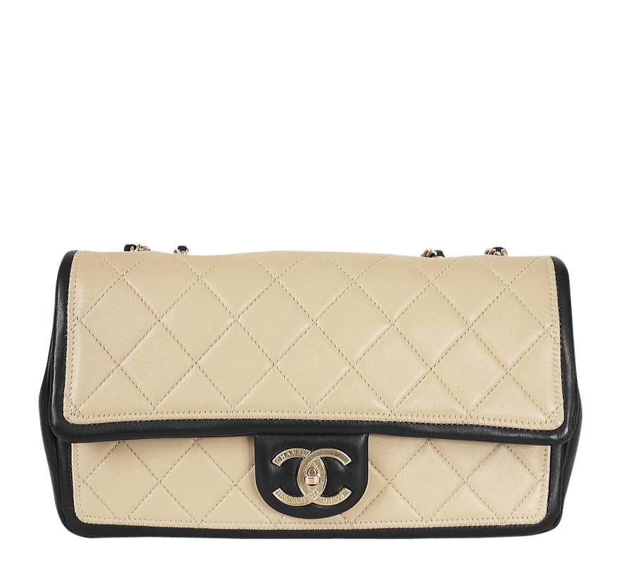 Chanel 2014 ss Cruise Collection 2.55 Bicolor Classic Shoulder Bag. Adjustable sliding chain makes the bag carried in double or single. Made from soft lambskin.

Strap drops about : Single 9 inches, Double 17 inches long
Comes with : Authenticity