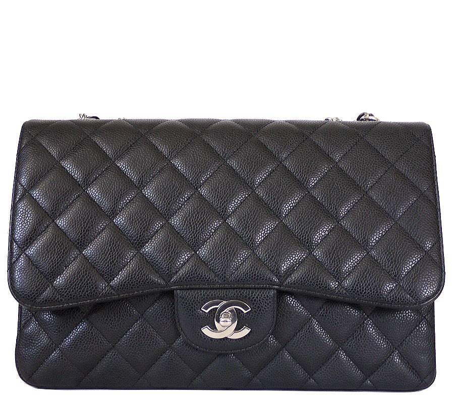 Chanel Black Caviar Maxi Jumbo Flap bag. Silver hardware. Gently worn, beautiful maxi. This kind of oversize Chanel classic flap bags are the high impact statement purse. Never out of style, you can cherish this bag for many years.  Wearable across