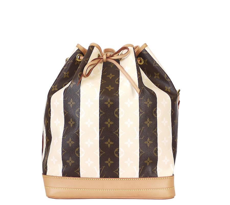 Rare Louis Vuitton Monogram Rayures Noe Limited Edition in excellent used condition. This size is quite hard to find. Sold out everywhere. Monogram Rayures canvas immediately appeal to women with an eye for fashion. The perfect bag for the city.