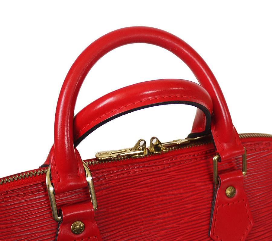 Women's   Louis Vuitton Red Epi Alma Handbag