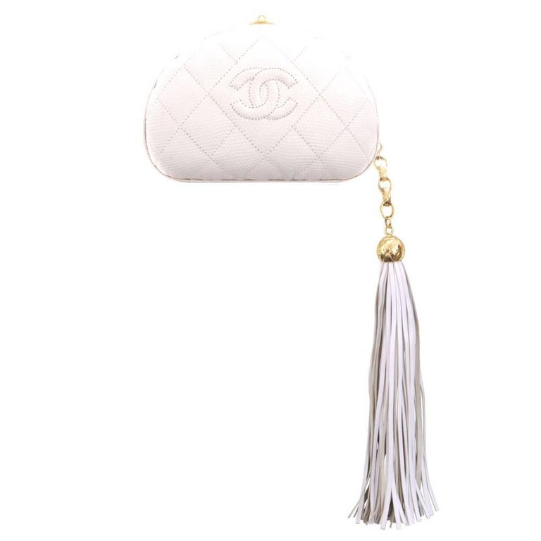 1980s Gold Chanel Clutch with Pearl Tassel at 1stDibs  chanel gold clutch  bag, chanel clutch gold, chanel pearl clutch