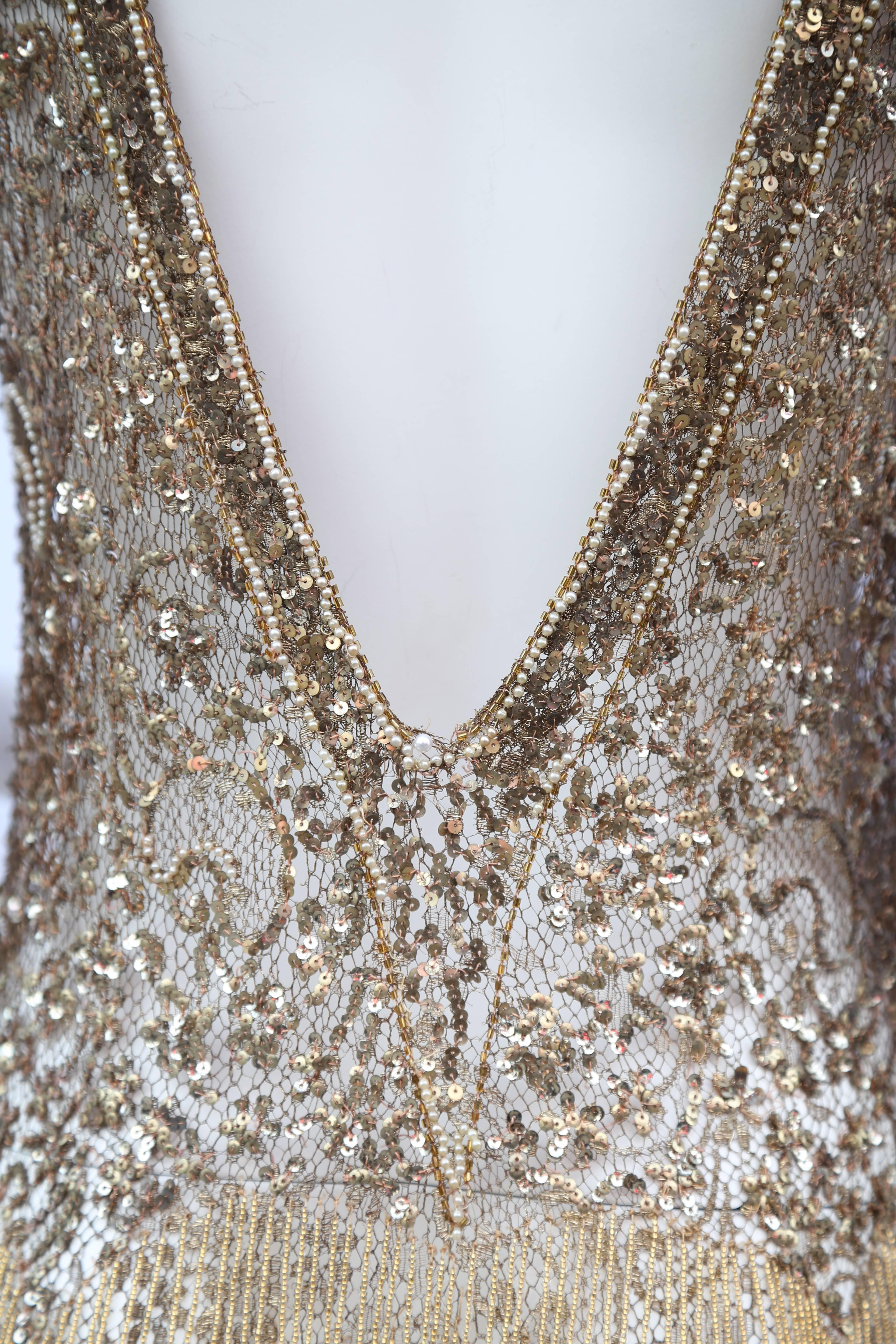 Women's 1920s gold lace and beaded sequin flapper dress