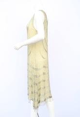 1920s yellow silk and silver beaded flapper dress