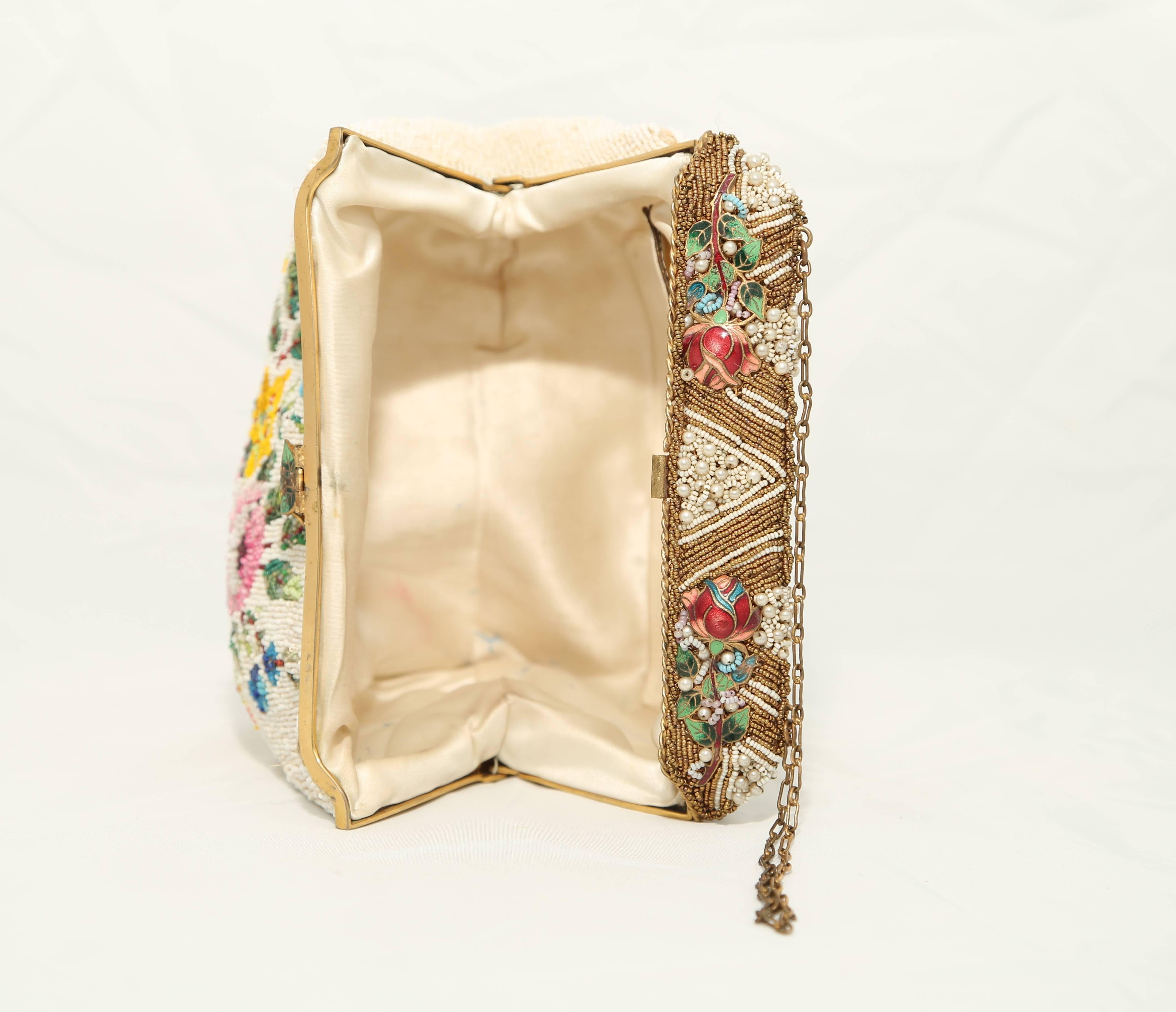 Women's 1920s fully beaded bag with floral pattern enamel handle with small pearls  