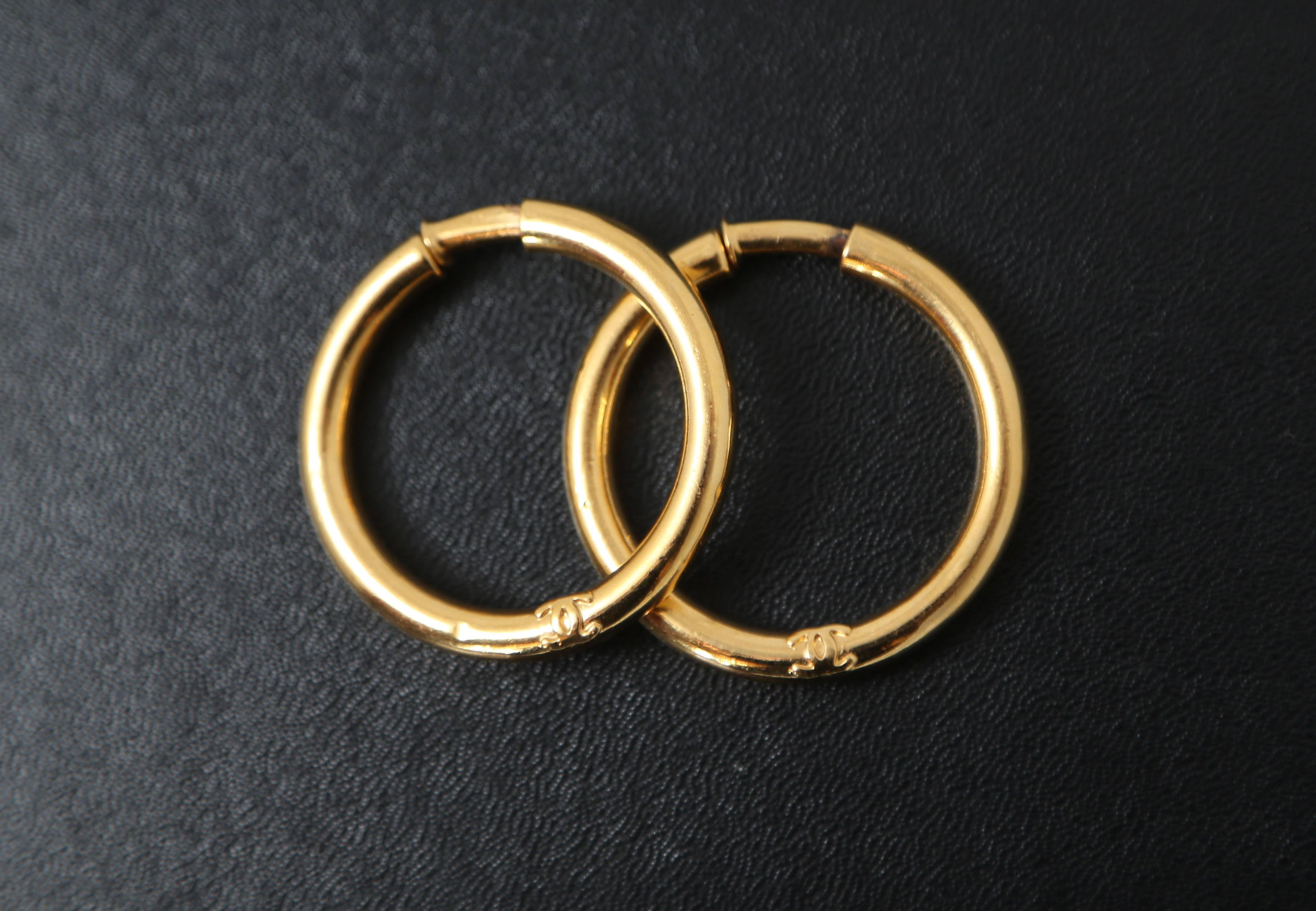 1980s Chanel hoop gold plated clip on earrings embossed cc  In Excellent Condition In London, GB