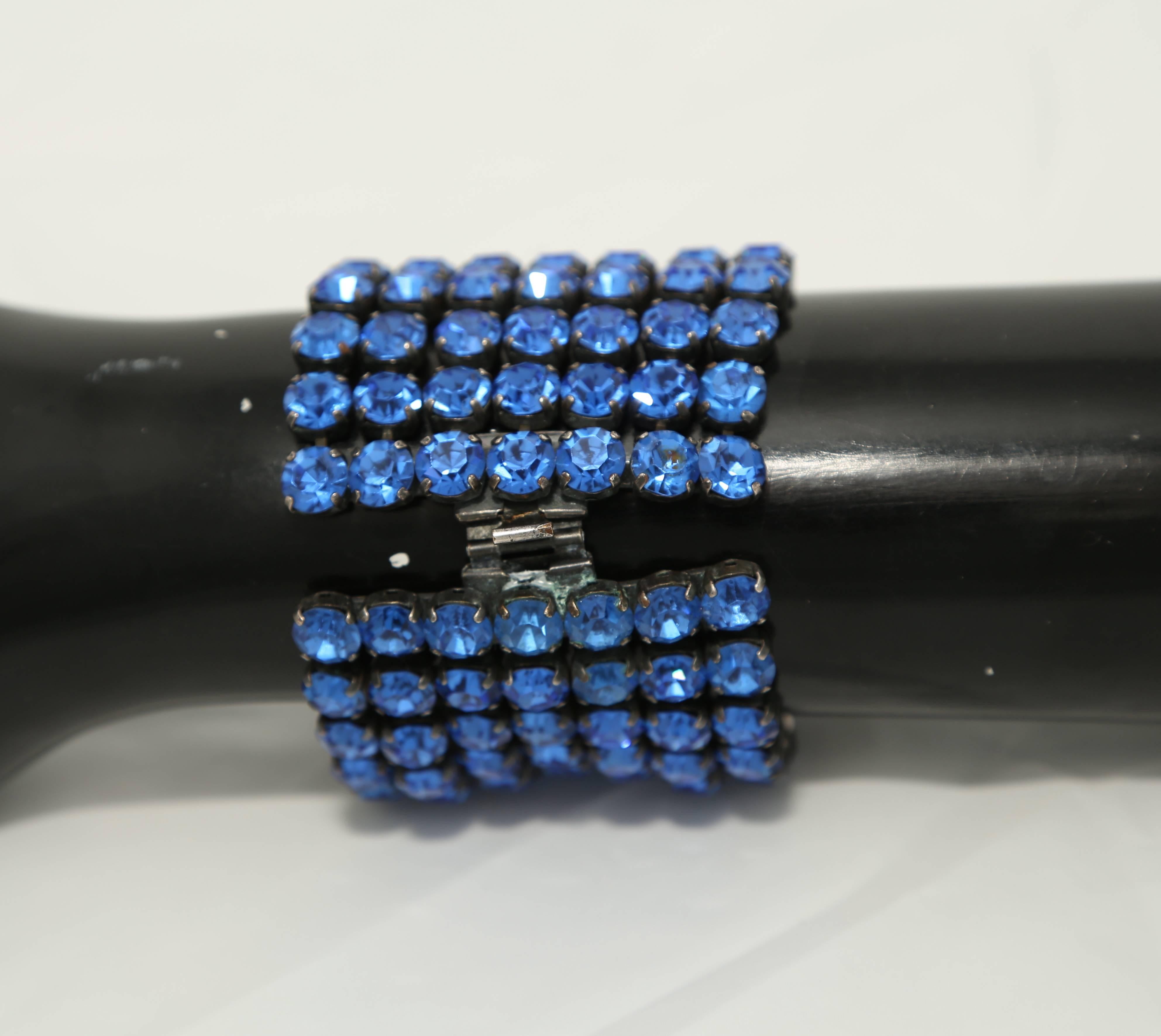 A vintage 1940s large vibrant blue rhinestone cuff bracelet 

Measures 

Length – 7 
Width - 2
