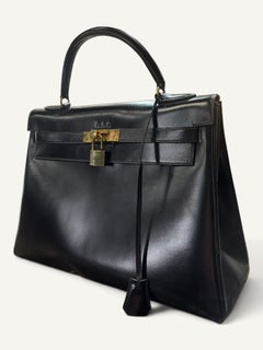 Sac Hermès Kelly 32 box noir 1956