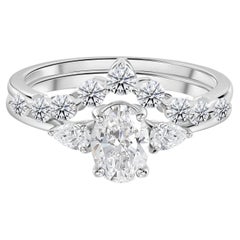 1.25 Ct Moissanite Marquise and Round Ring in 18K White Gold
