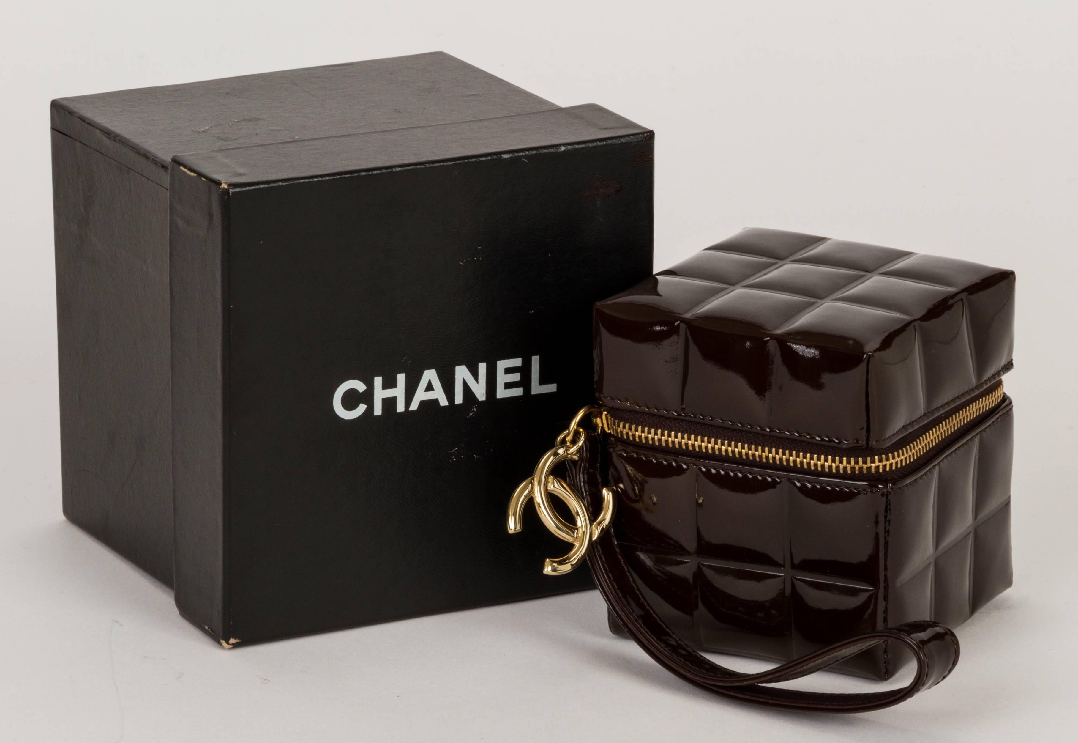Chanel dark brown patent leather evening cube bag with suede interiors. Comes with original ID card and box.
