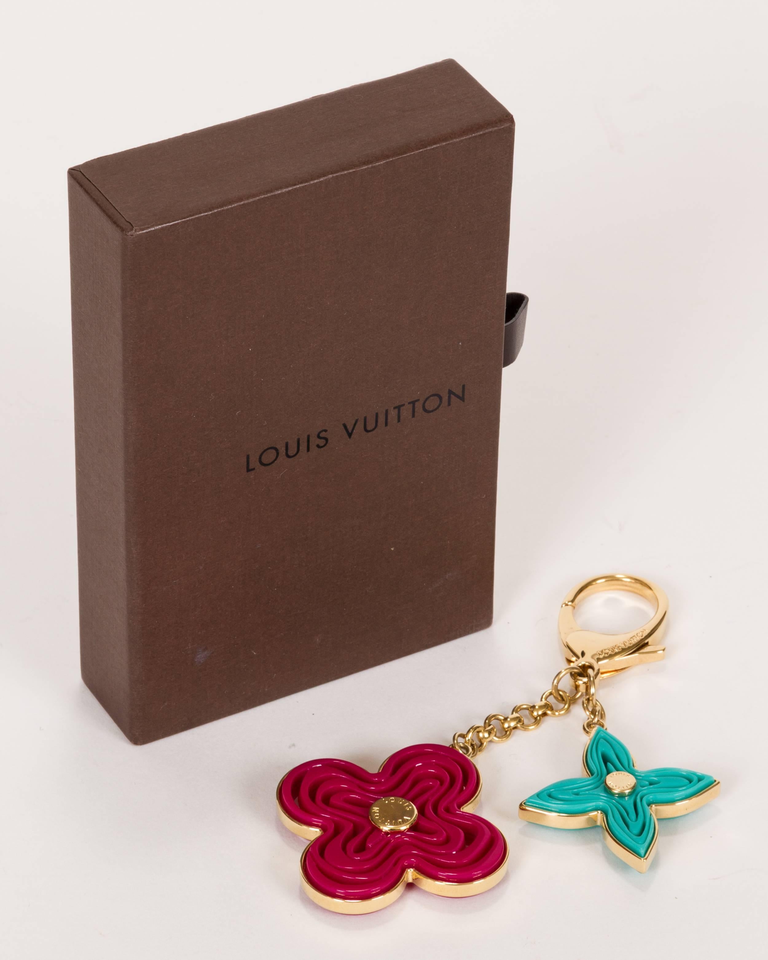 Louis Vuitton bag charm /keychain Gold tone metal and multicolor lucite Excellent condition Comes with original box.