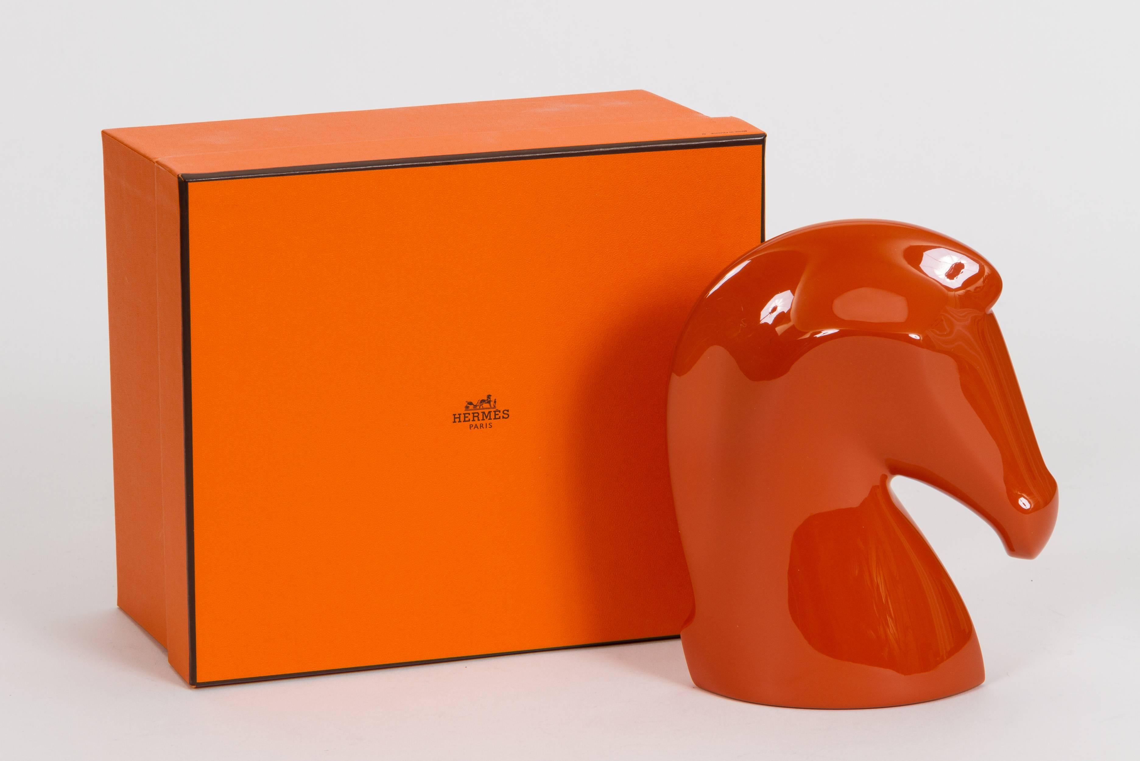Hermès orange resin Samarcanda horse decorative object in box. Made in Vietnam.
