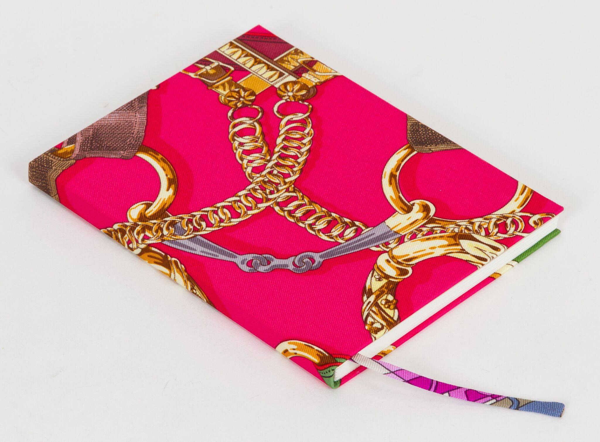 Hermès fuchsia chains silk notebook. Never used. Comes with original box, ribbon, and gift bag.