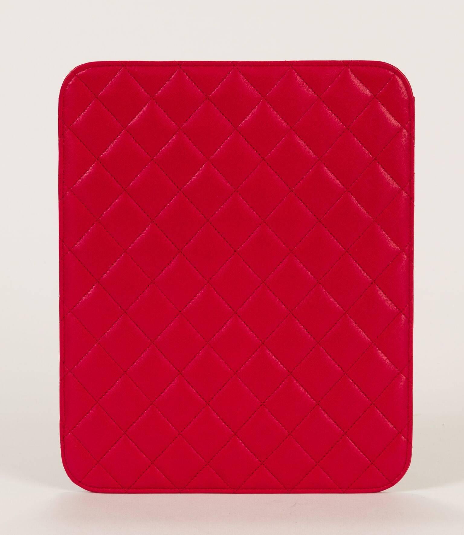 Chanel red lambskin quilted ipad cover case. Comes with original box, hologram and id card. Brand new.