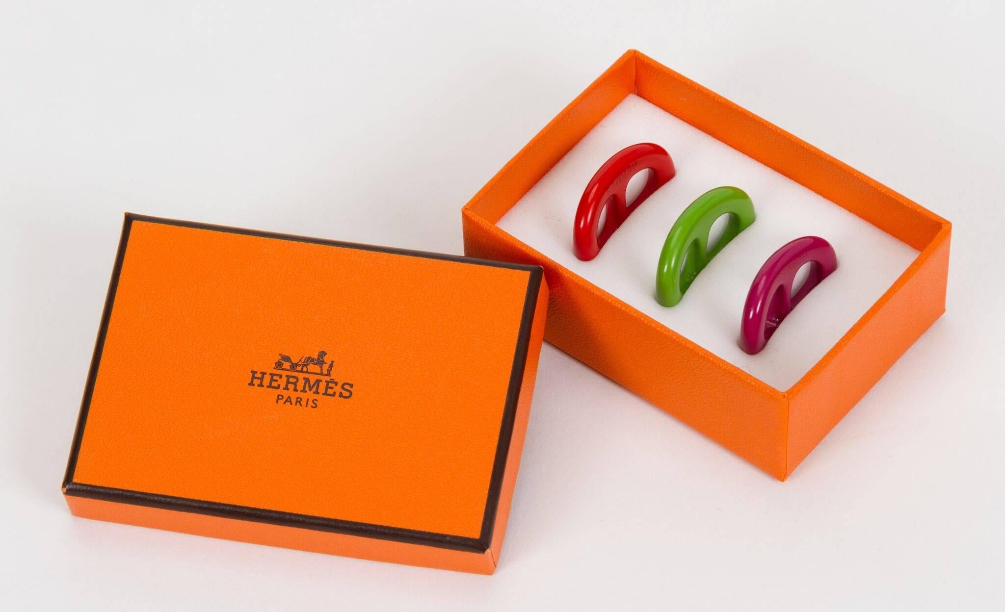 Hermes set of 3 color resin scarf rings. Scarf not included. 2006. Comes with original box and ribbon.
