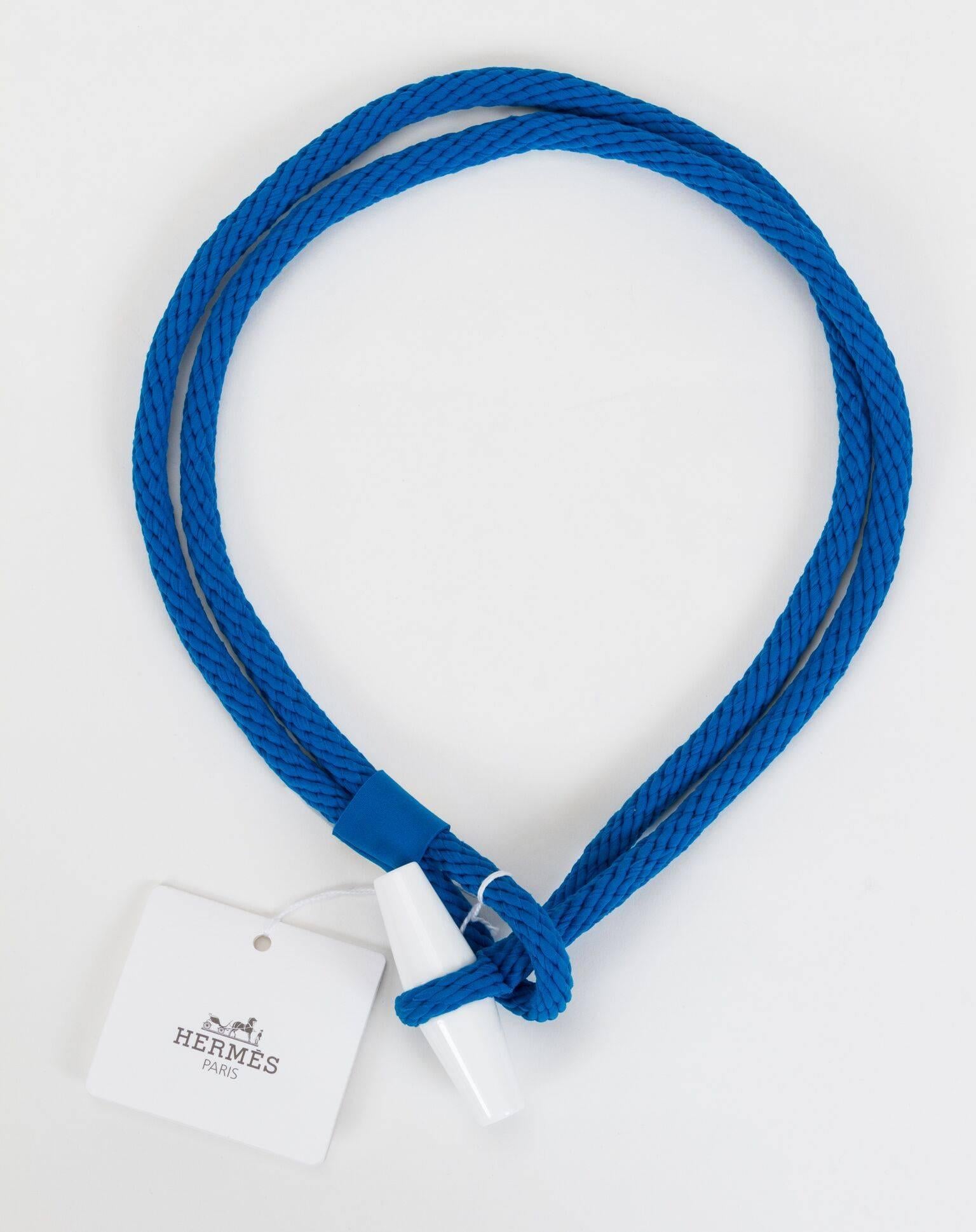 Hermès tricot belt, bleu outremer and white resin toggle. Brand new with tag. Size small.