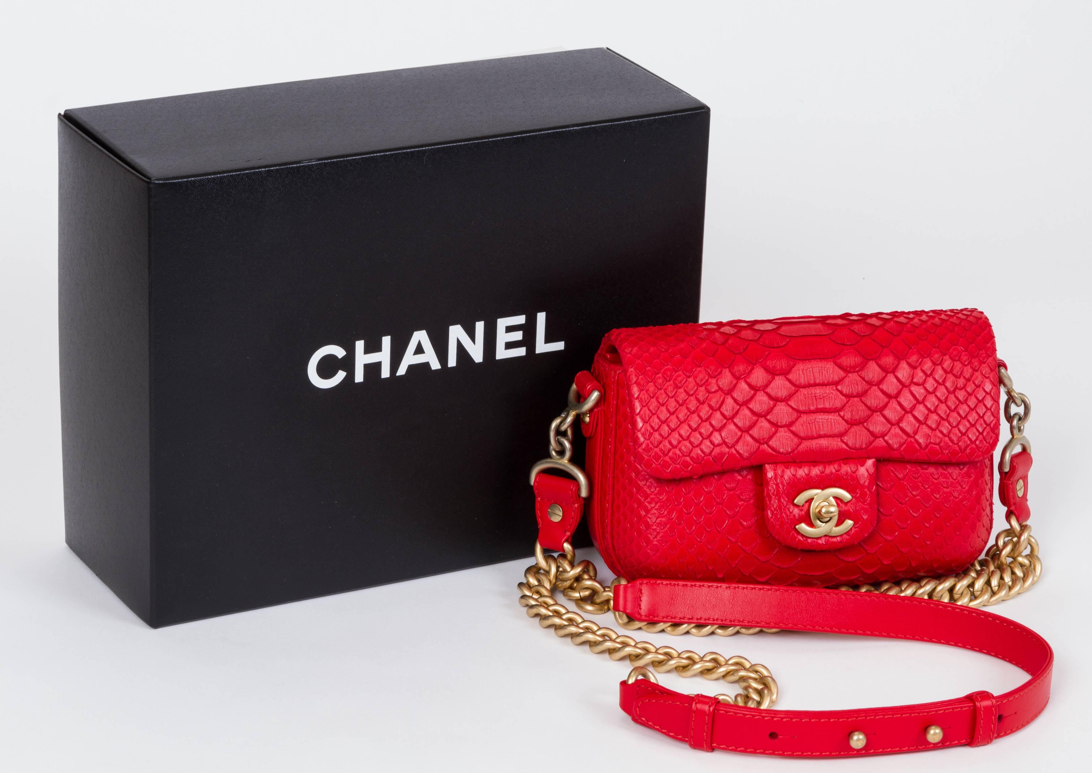 Chanel rare and brand new red python handbag with double strap. Handle drop 7