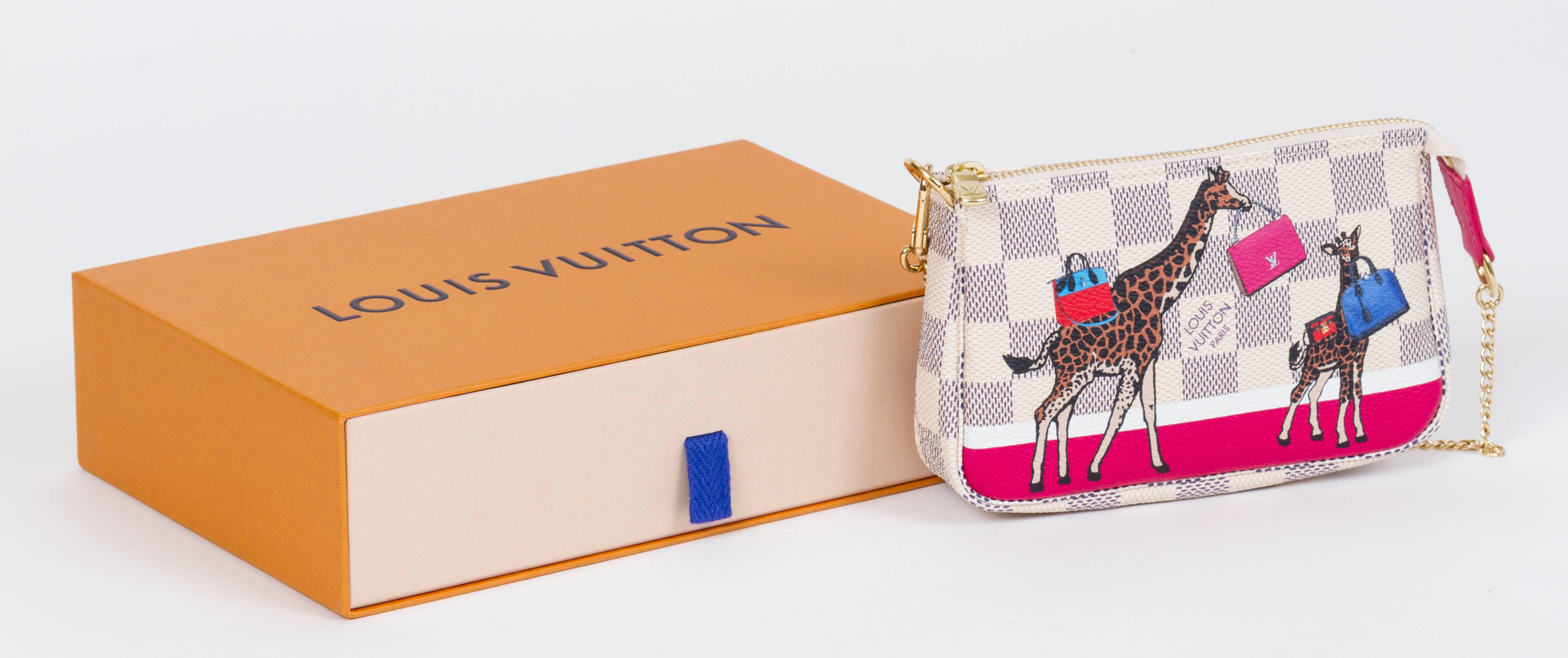 Louis Vuitton limited edition traveling giraffe white damier pouchette. Handle drop 6.25