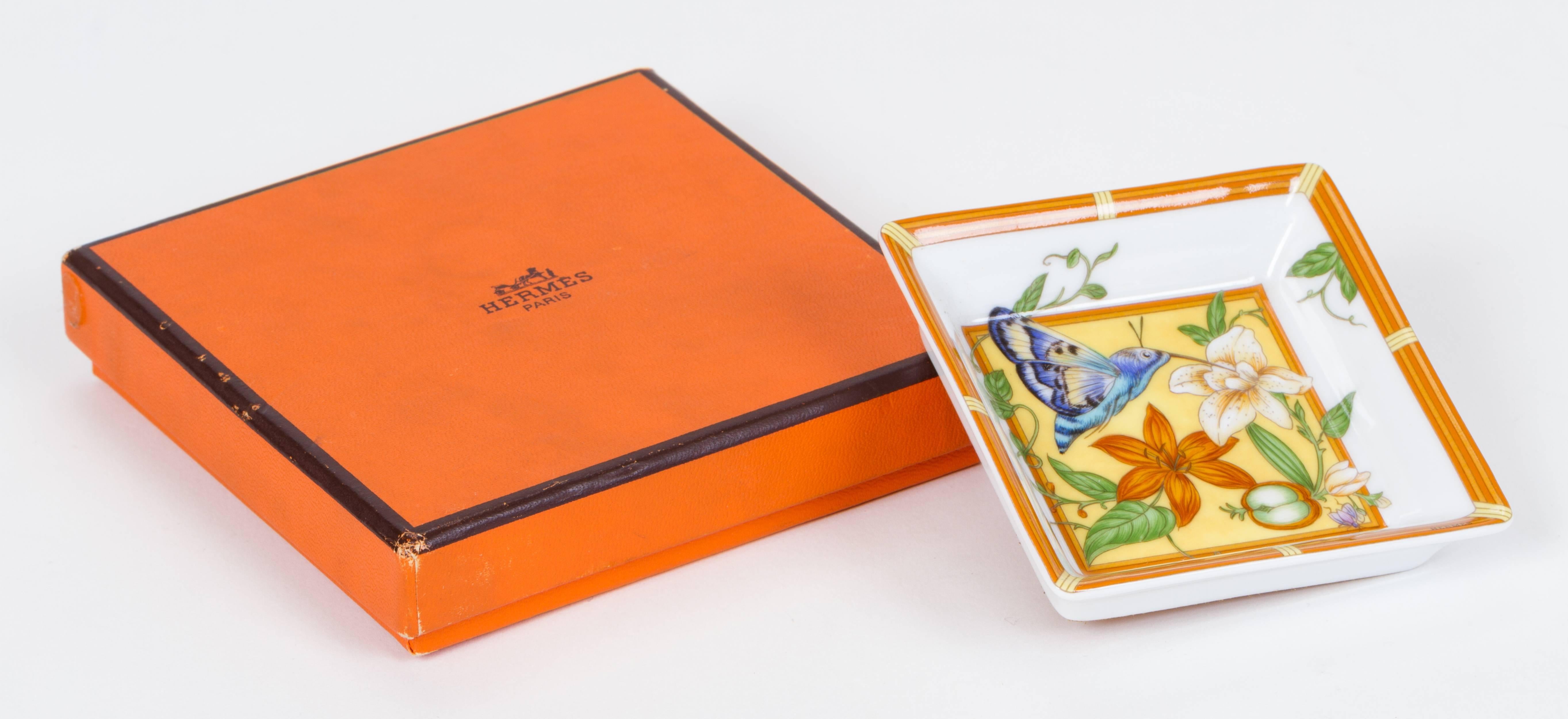 Hermès small single tray with butterflies and flowers design. Comes in original box.