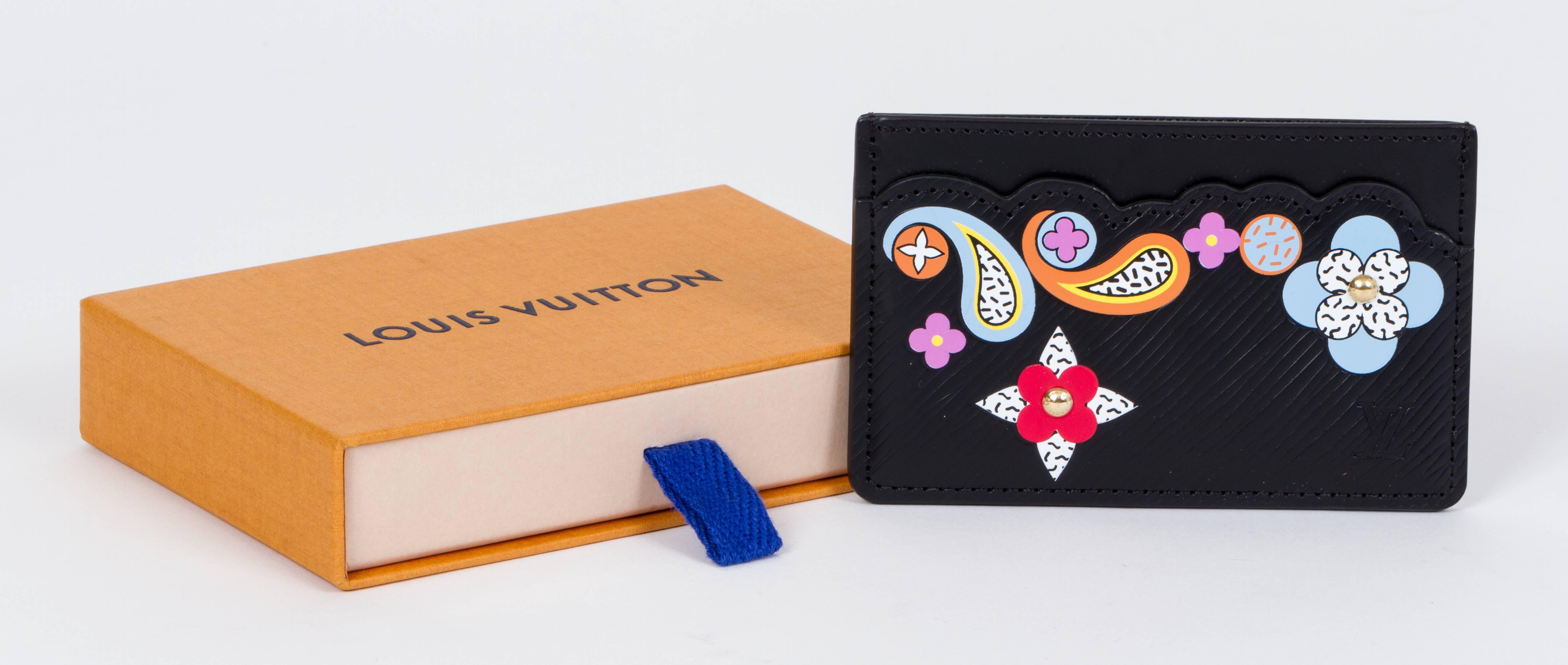 Louis Vuitton cardholder in black epic leather with pop art monogram flowers. Brand new with dust cover and box.