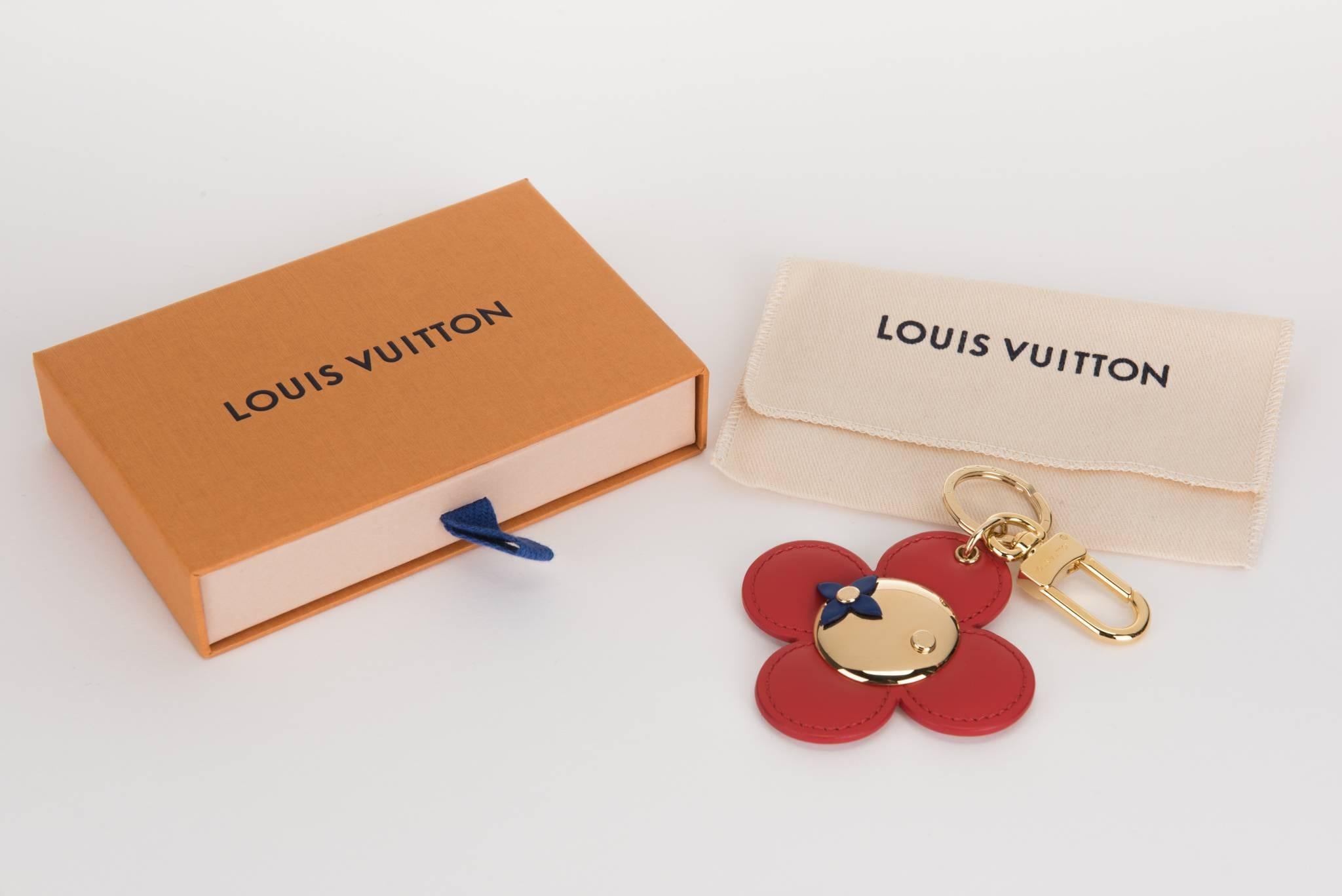 Louis Vuitton sold out vivienne flower  keychain, bag charm . Red and pink reversible leather . Comes with original dust cover and box.