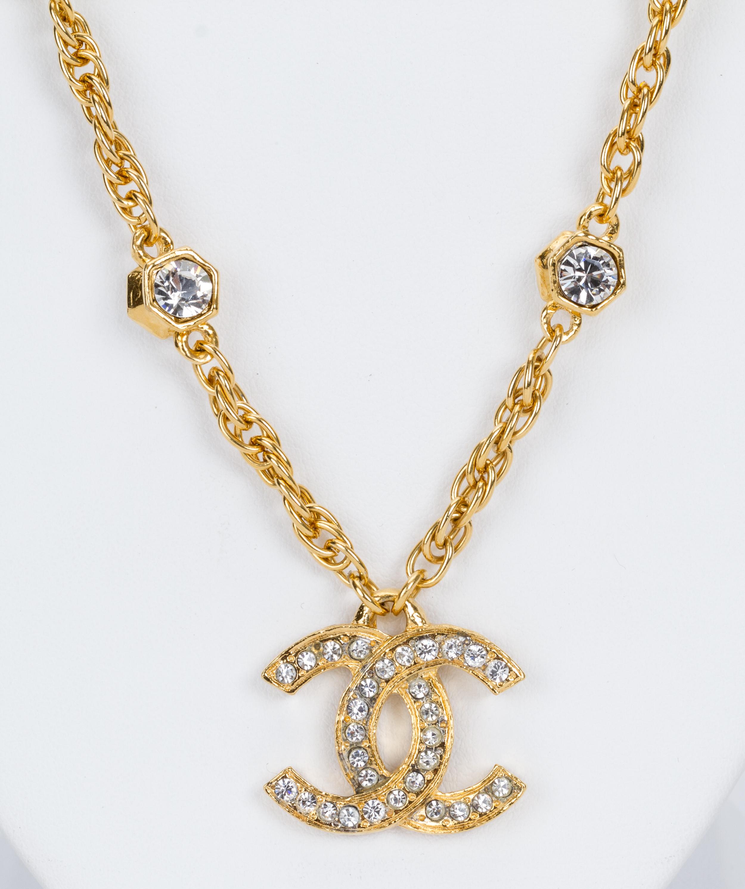 Rare 1970s Chanel rhinestone gold plated CC logo necklace. Excellent vintage condition. Comes with the original box.
