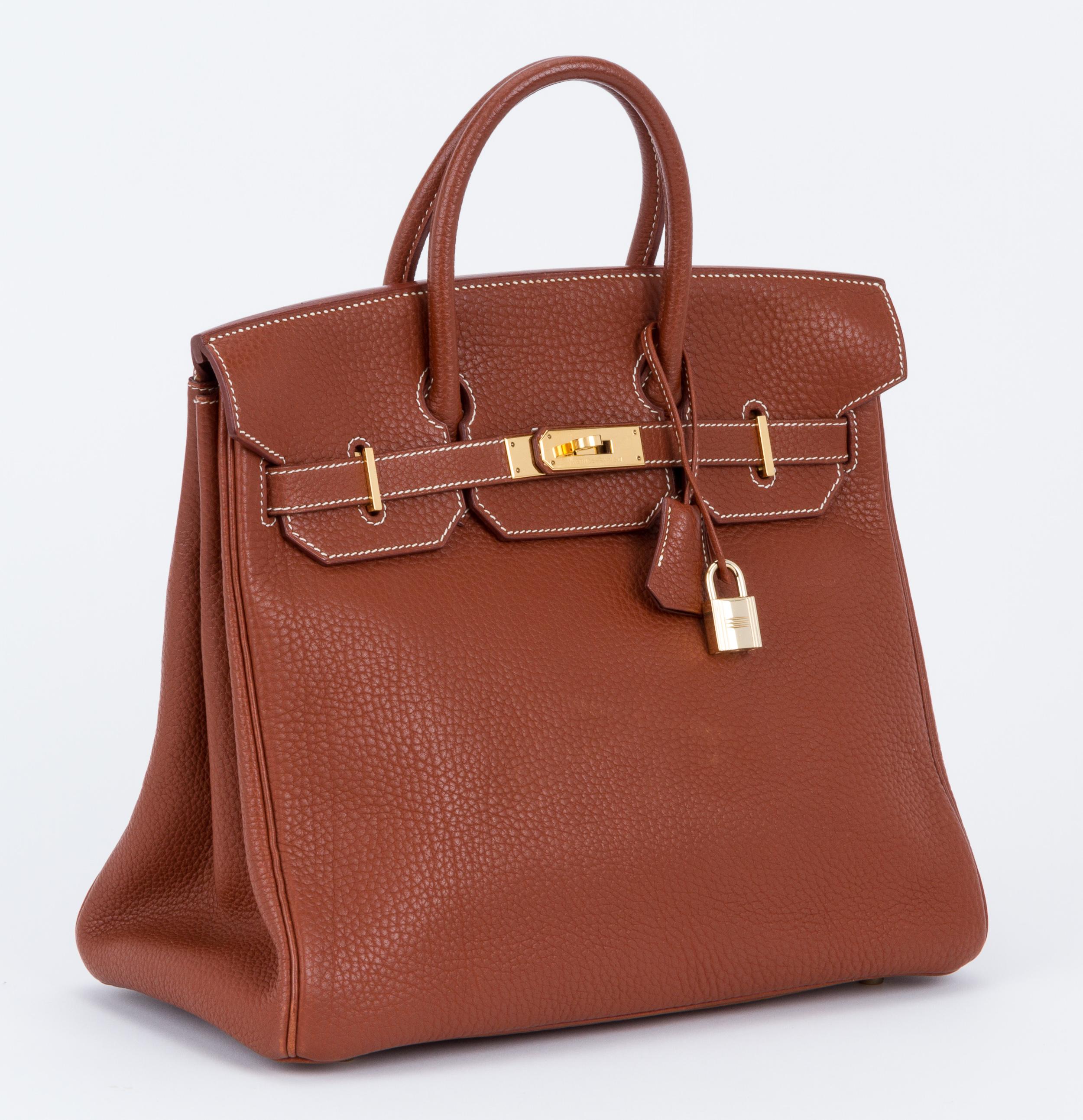 Hermes Birkin HAC 32cm in fauve fjord leather and gold tone hardware. Date stamp E for 2001. Minor wear on corners, please refer to photos. Comes with clochette, tirette, lock , 2 keys and original dust cover.