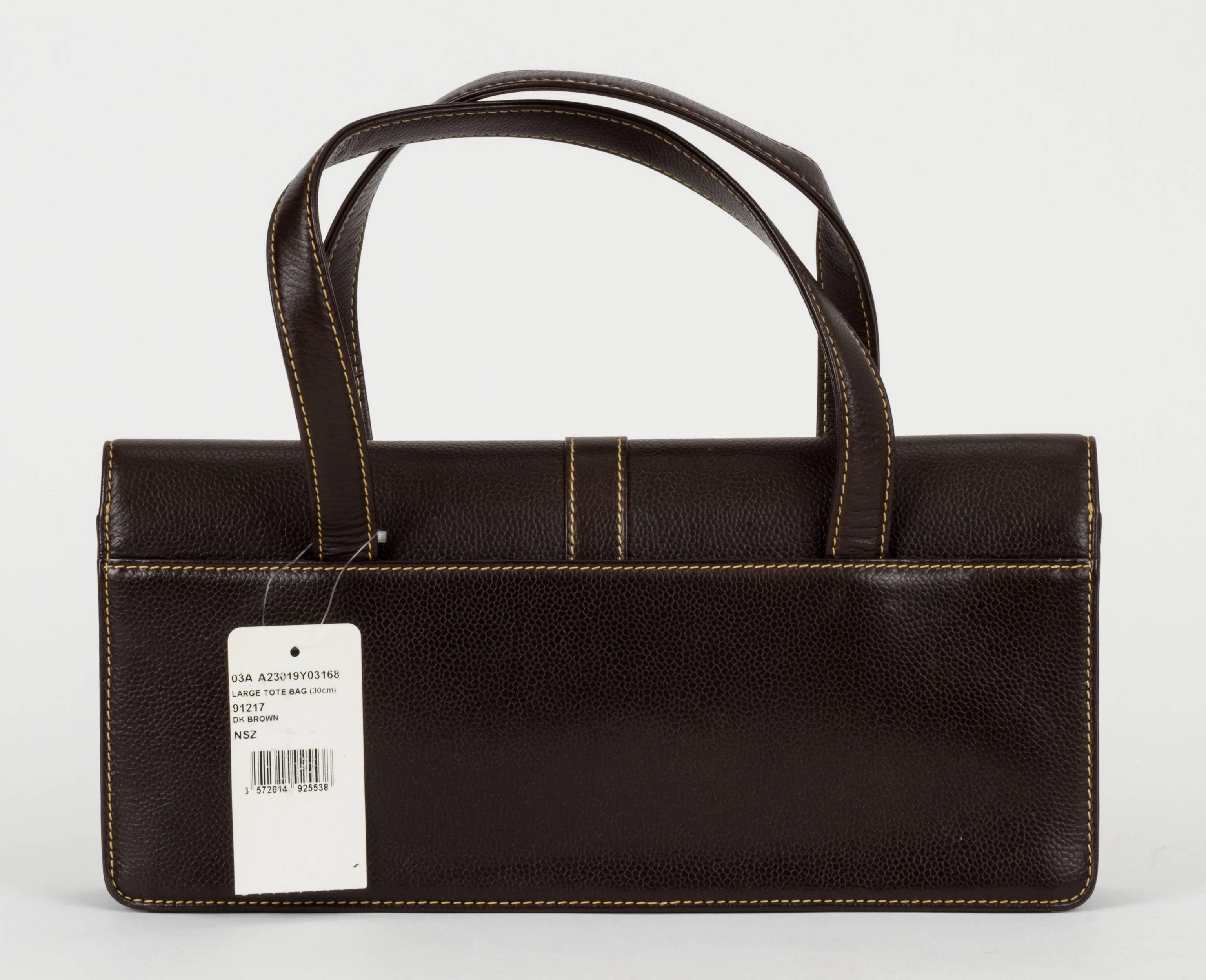 Chanel new-with-tag dark-brown caviar leather handbag. Handle drop, 7