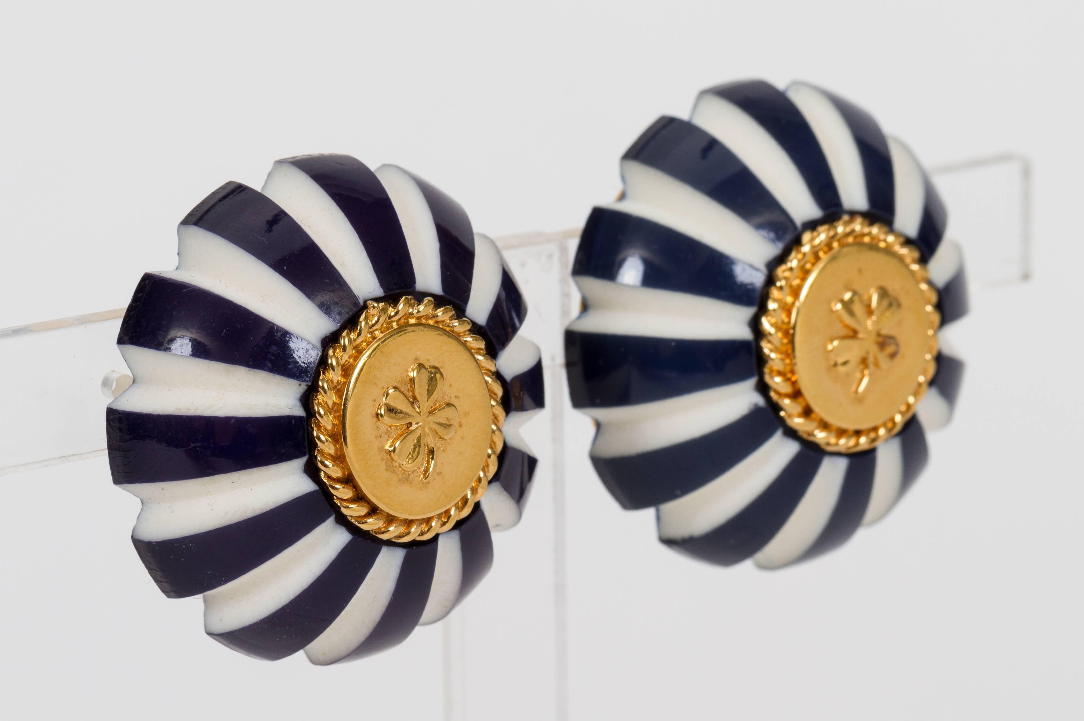 Chanel 70's collection rare round blue and white striped clover clip on earrings. Resin base with 18k plated rhodium metal. Come with velvet pouch. 
