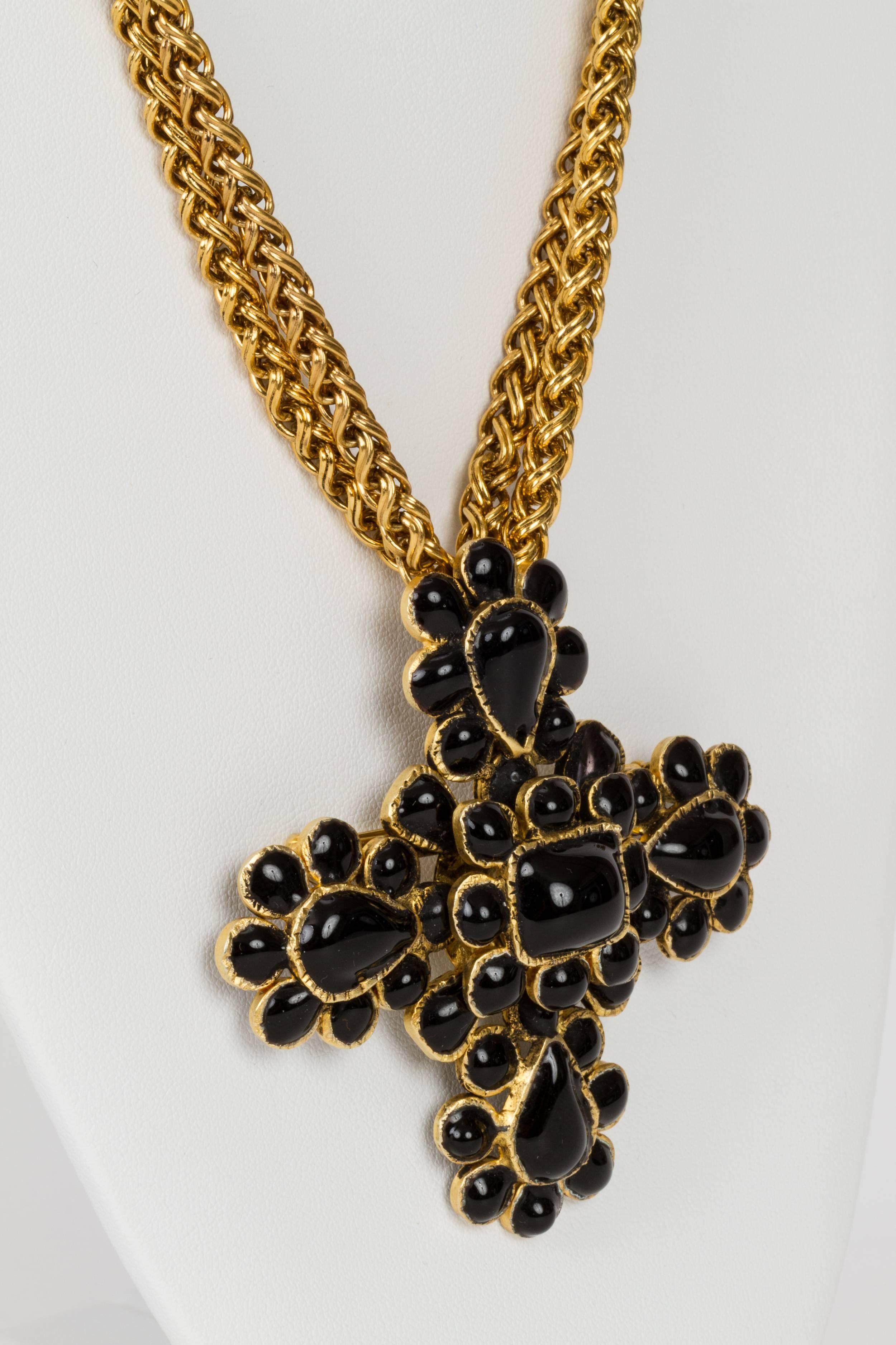 Rare Chanel black gripoix necklace with double-strand chain and detachable cross pin, 1982. Comes from a private collection and has never been worn. In the original vintage Chanel box.