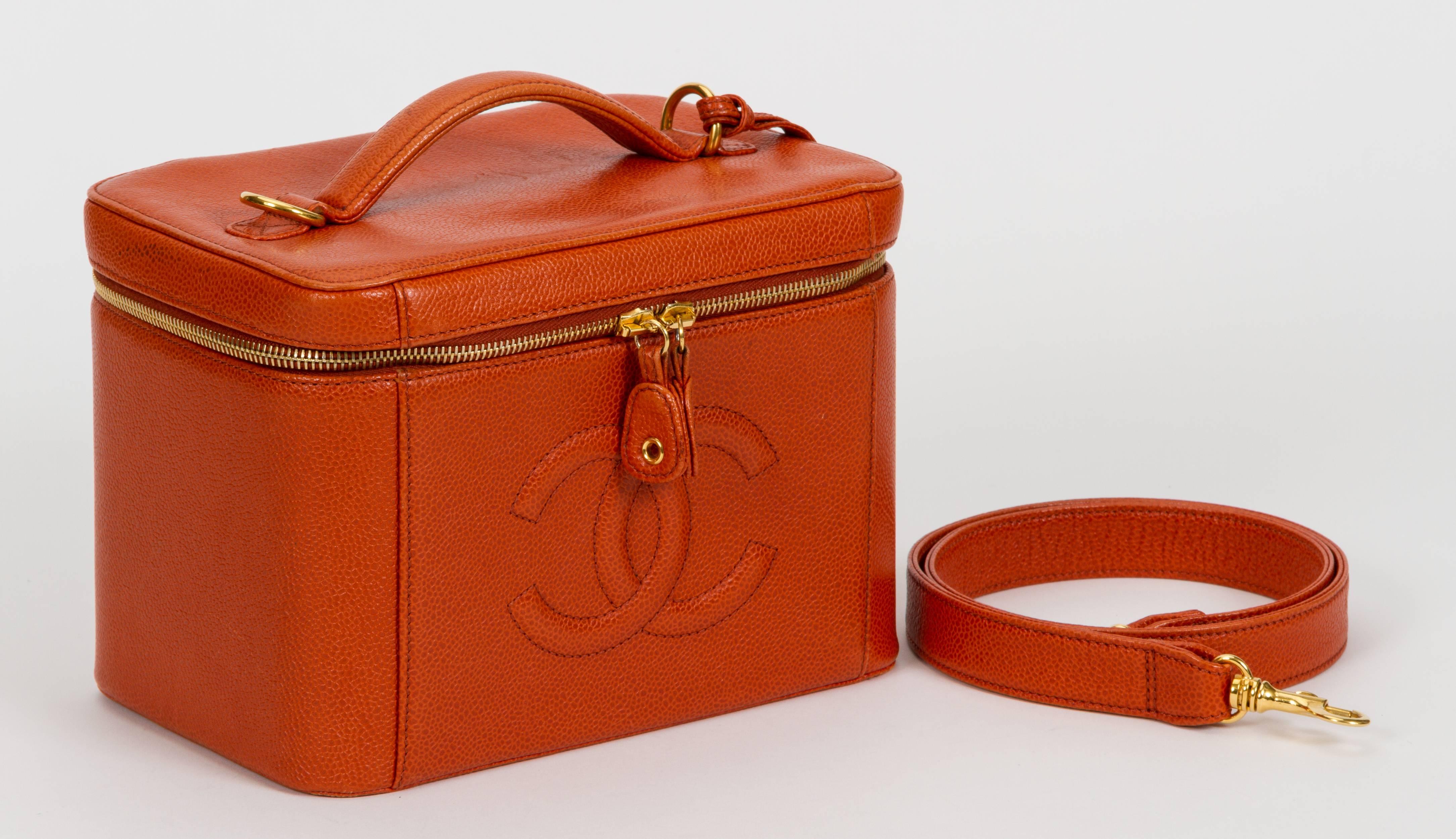 Chanel orange caviar beauty case, travel case. Can be worn two ways: shoulder drop, 19
