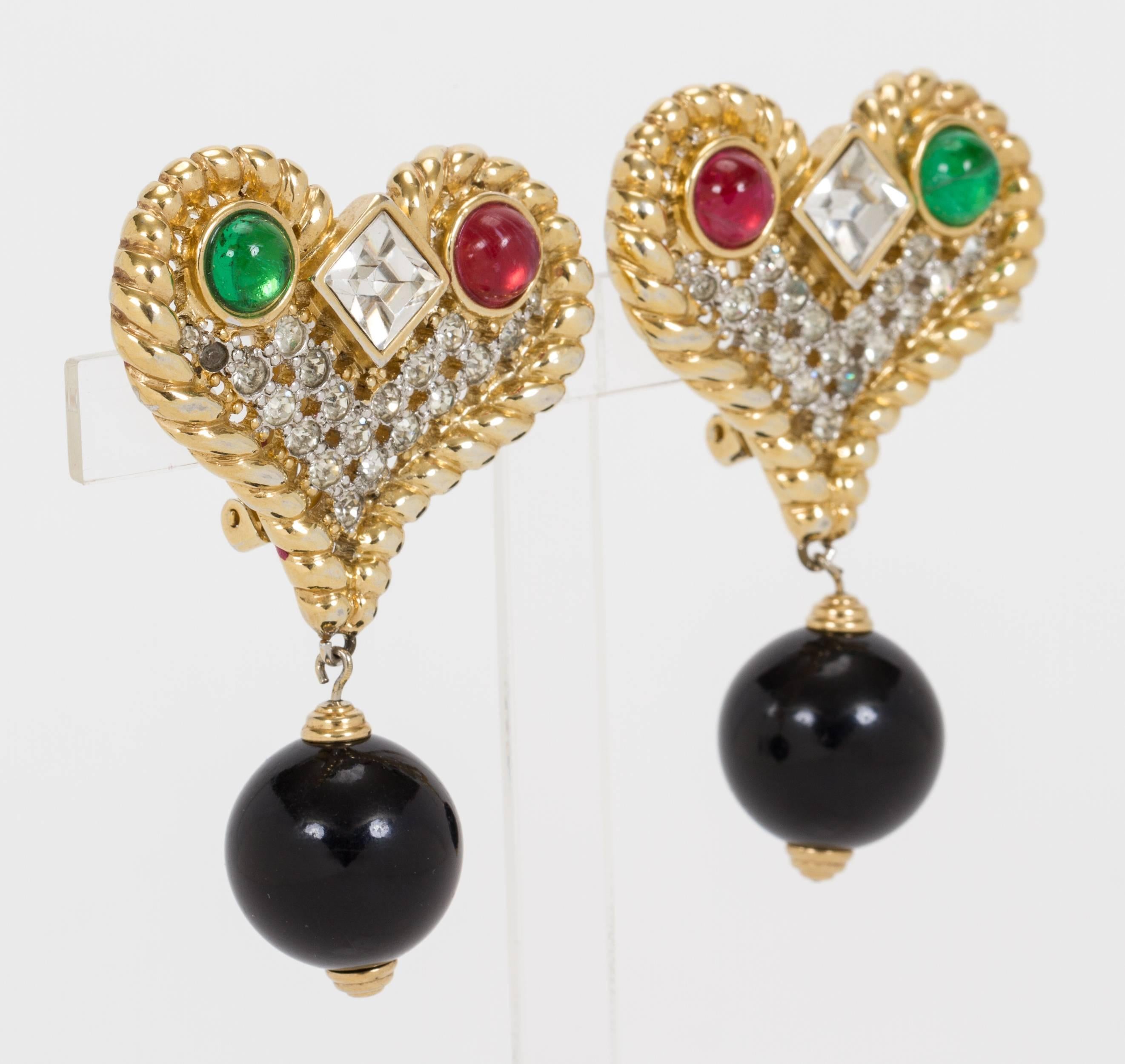 Valentino gold-plated oversize heart earrings with oversize black resin bead and glass multicolored rhinestones. Clip backs. Comes in a velvet pouch. Minimal wear.