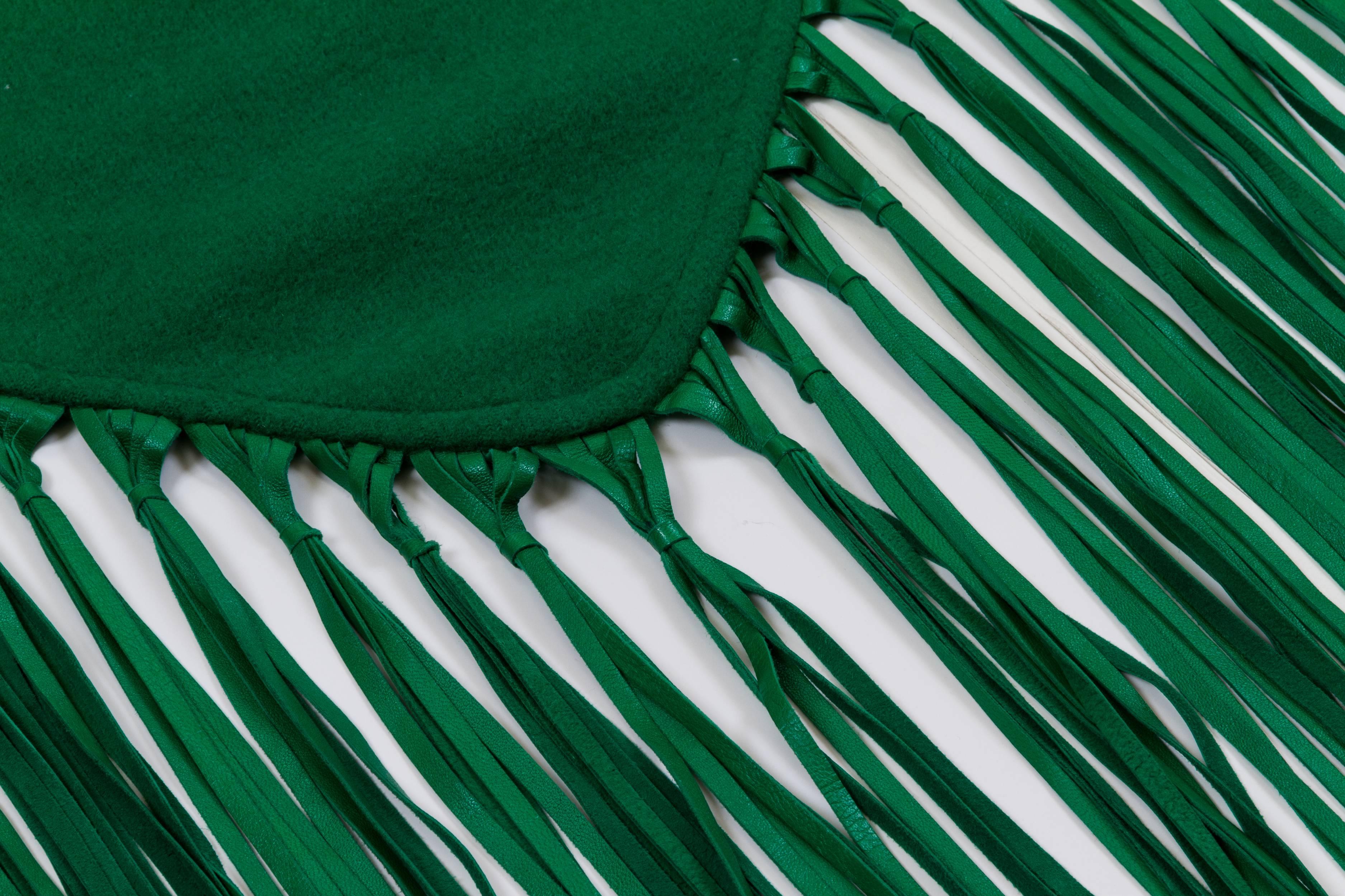 Hermès emerald green 100% cashmere shawl with lambskin fringe. Comes with original box.