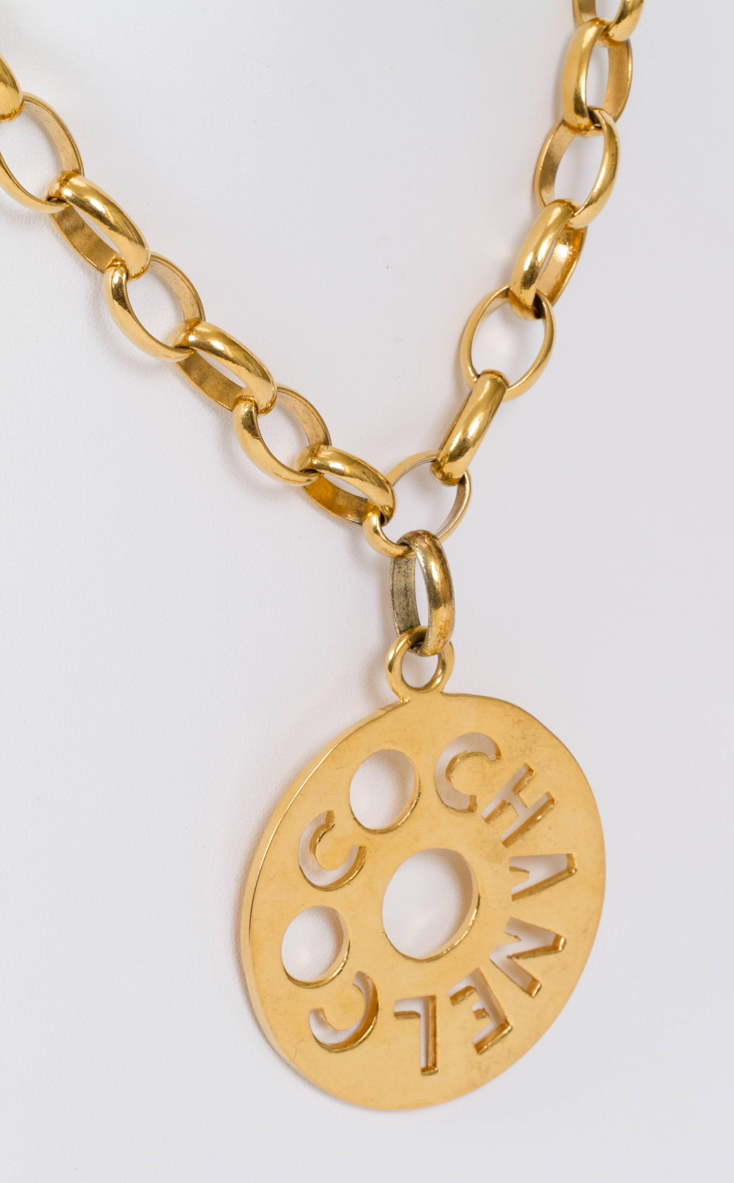 Coco Chanel oversize medallion necklace with round pendant. Comes with original box. Minor wear.
