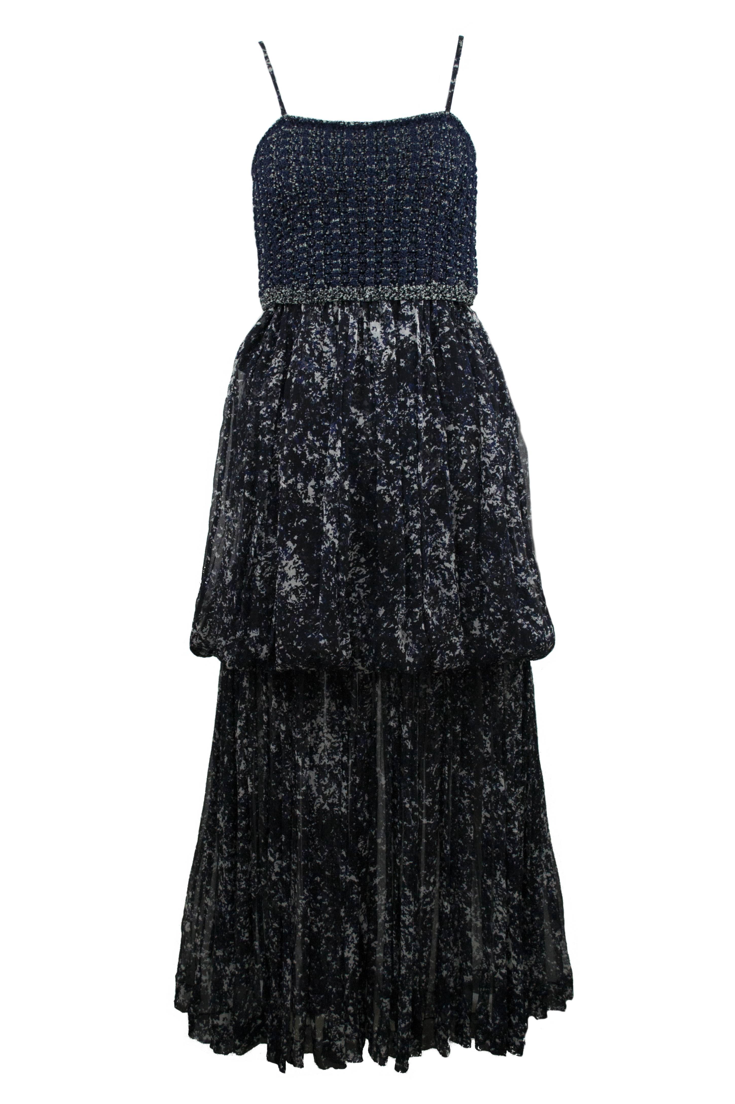 Chanel limited edition silk navy and cream chiffon gown with matching print shawl in size 34. Originally retailed $9,000. Bodice is a knit cotton and viscose boucle with a multi layer chiffon skirt starting at the true waist. Zip back closure. Shawl