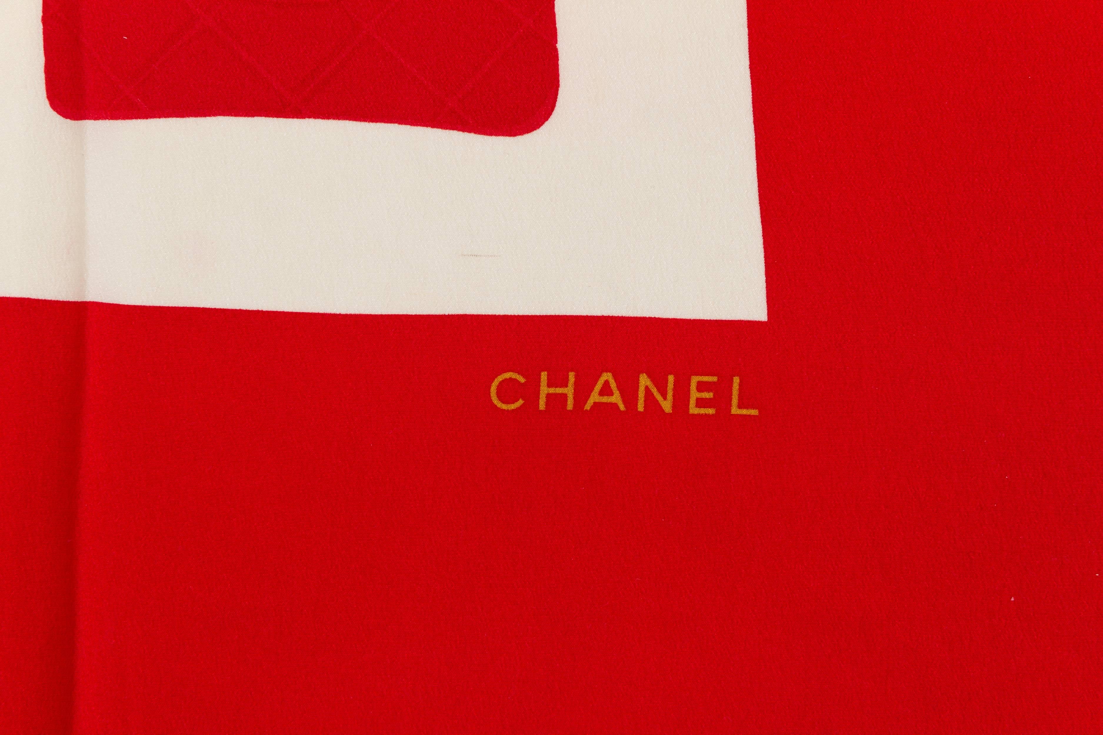 Chanel 90's collection 100% pure silk scarf with classic flap purse design. Hand rolled edges. Does not include box. 