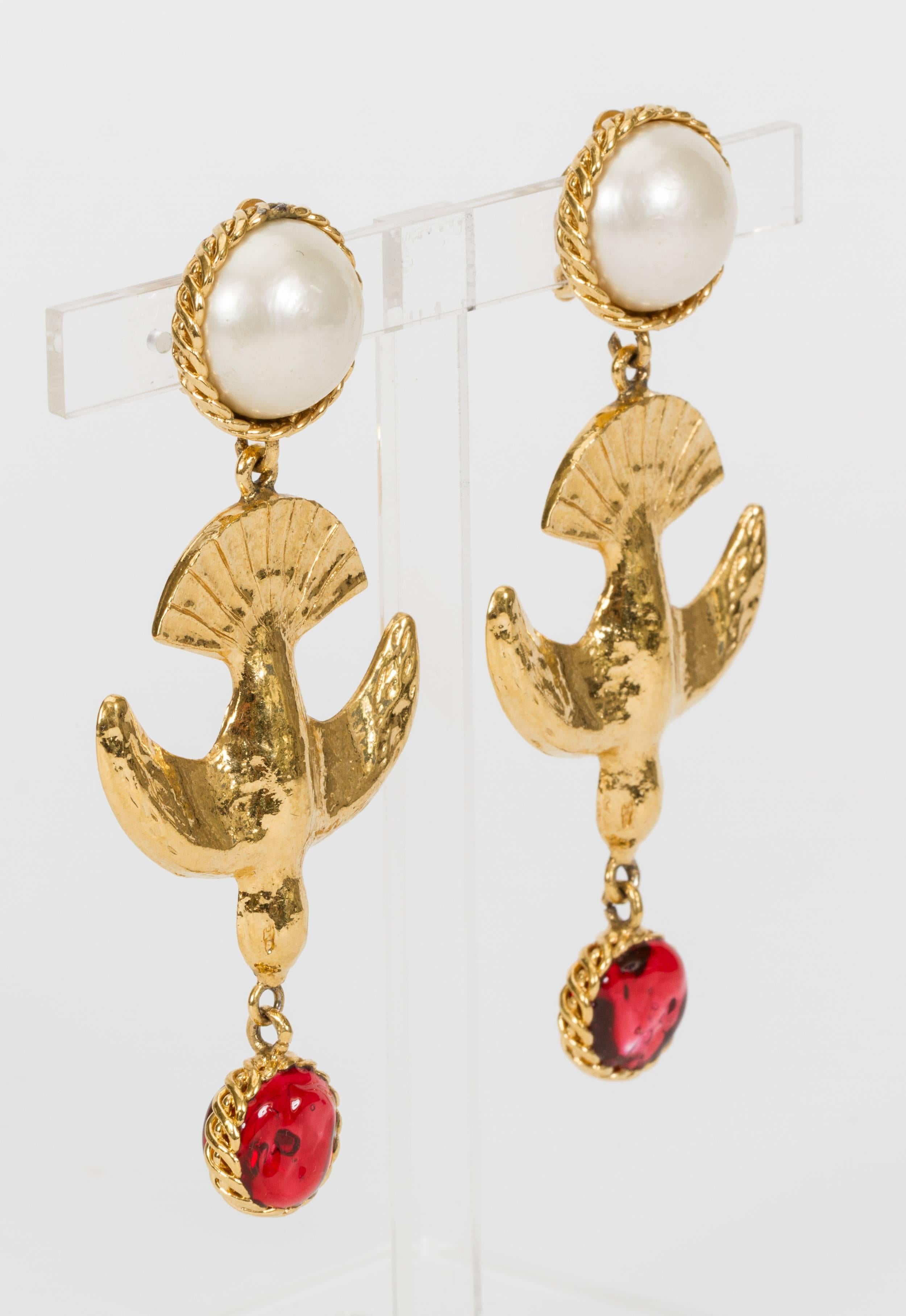 Chanel 70's collection unique bird earrings with red gripoix and pearl clip on earrings. Come with original box. Great condition