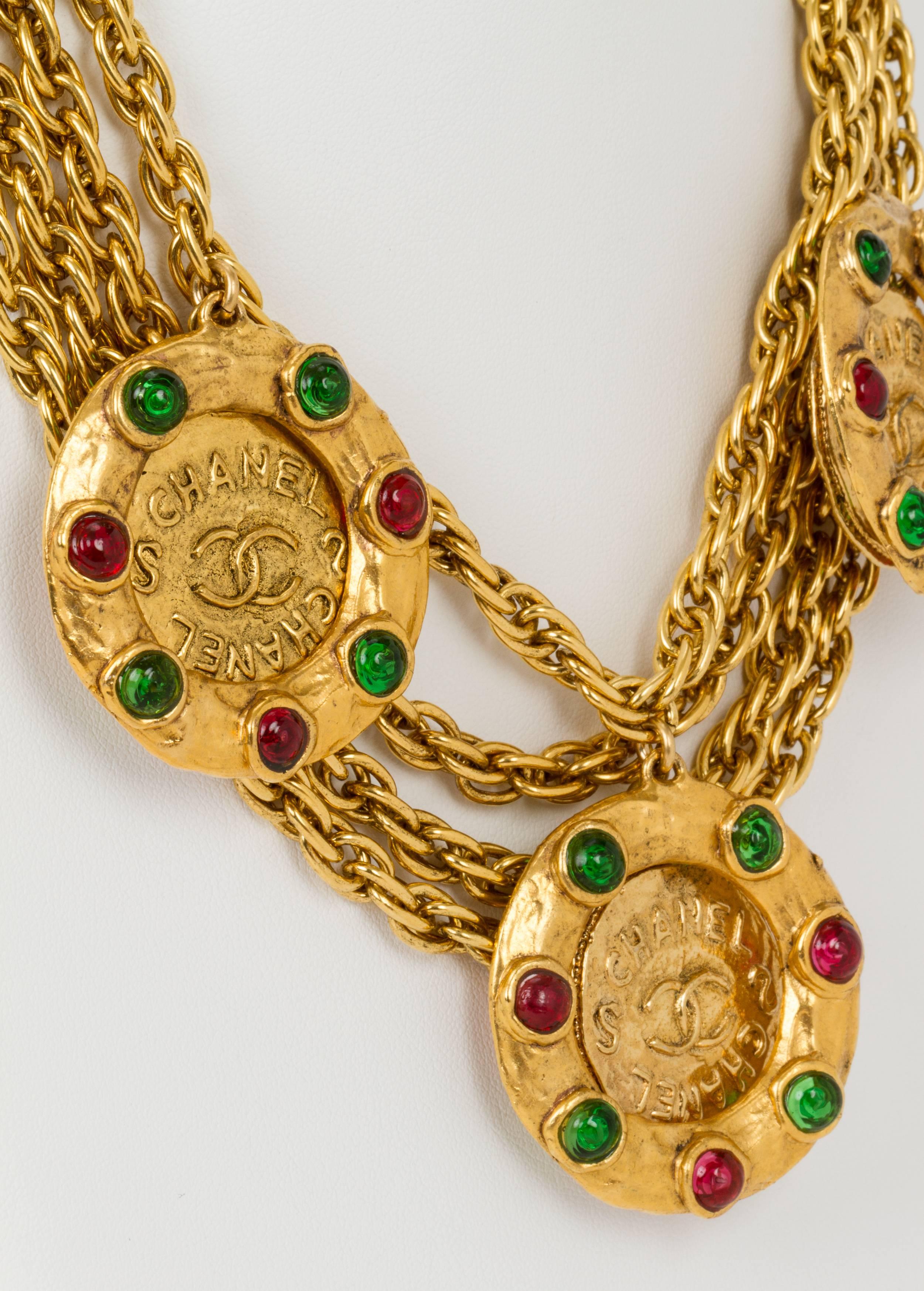 Rare 1970s Chanel oversize goldtone chain necklace with green and red gripoix dangling logo coins. From a private collection. Comes with the original vintage Chanel box.
